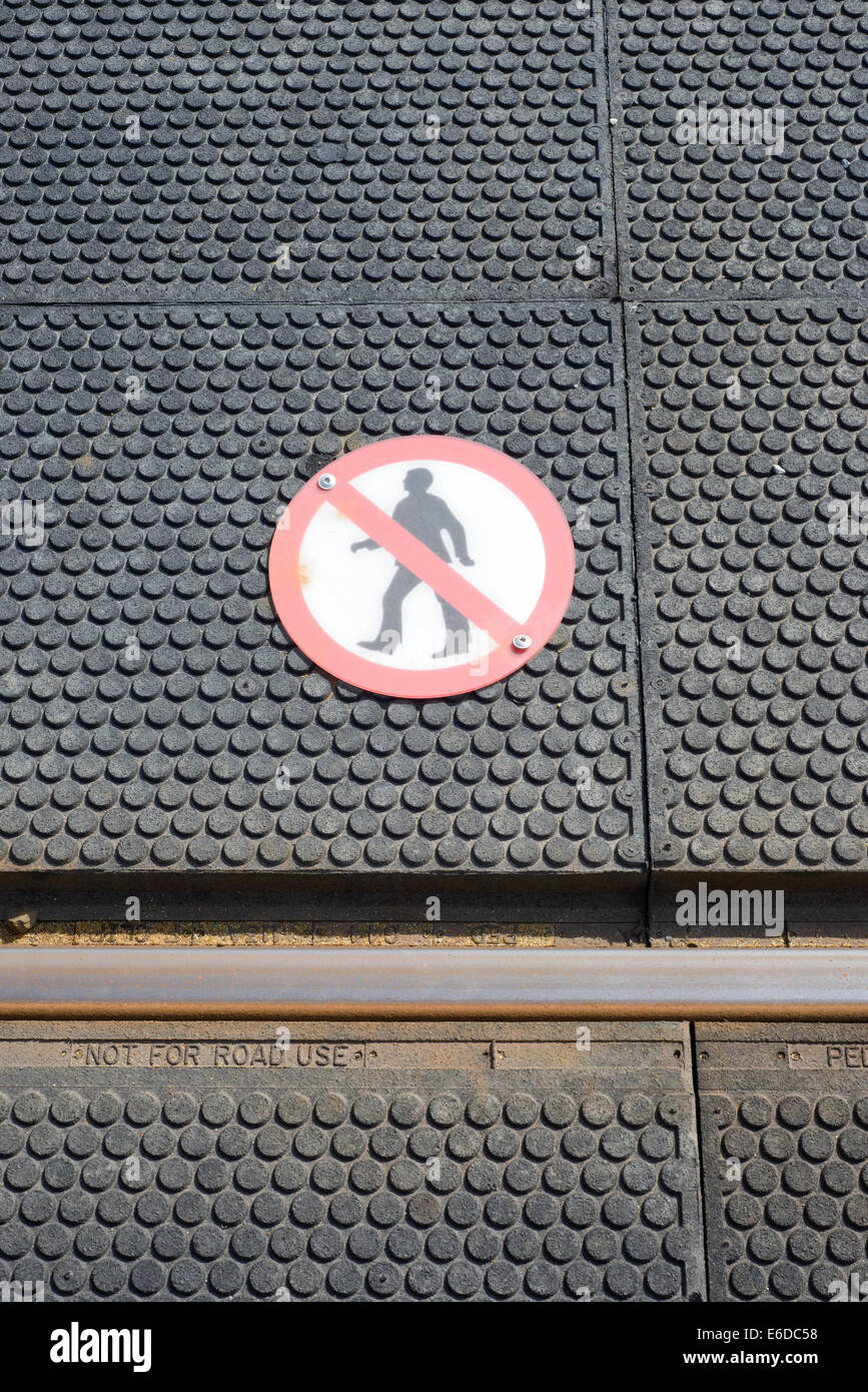 No Pedestrians sign on tram tracks Stock Photo