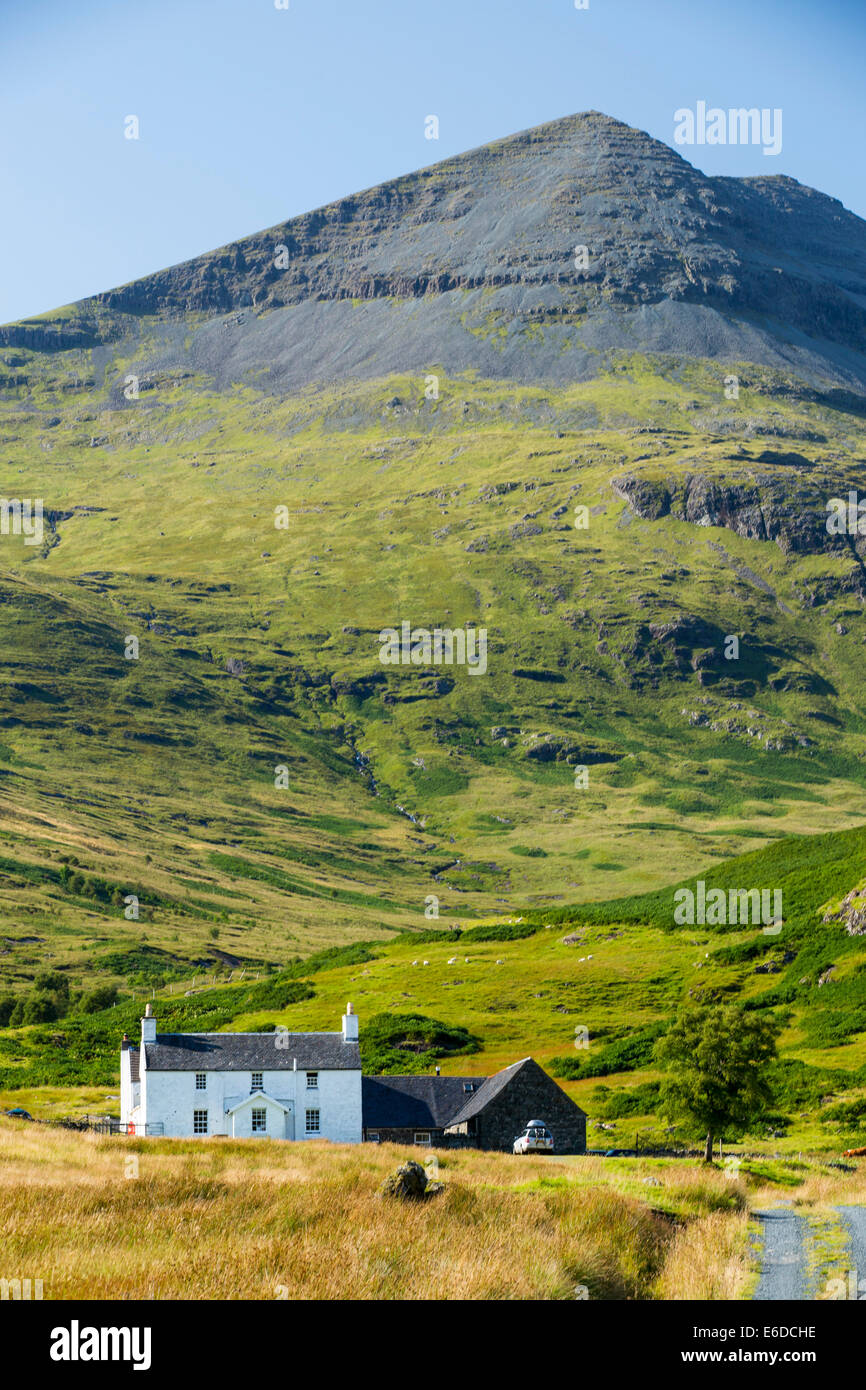 An isolated house beneath Ben More on the Isle of Mull, Scotland, UK. Stock Photo