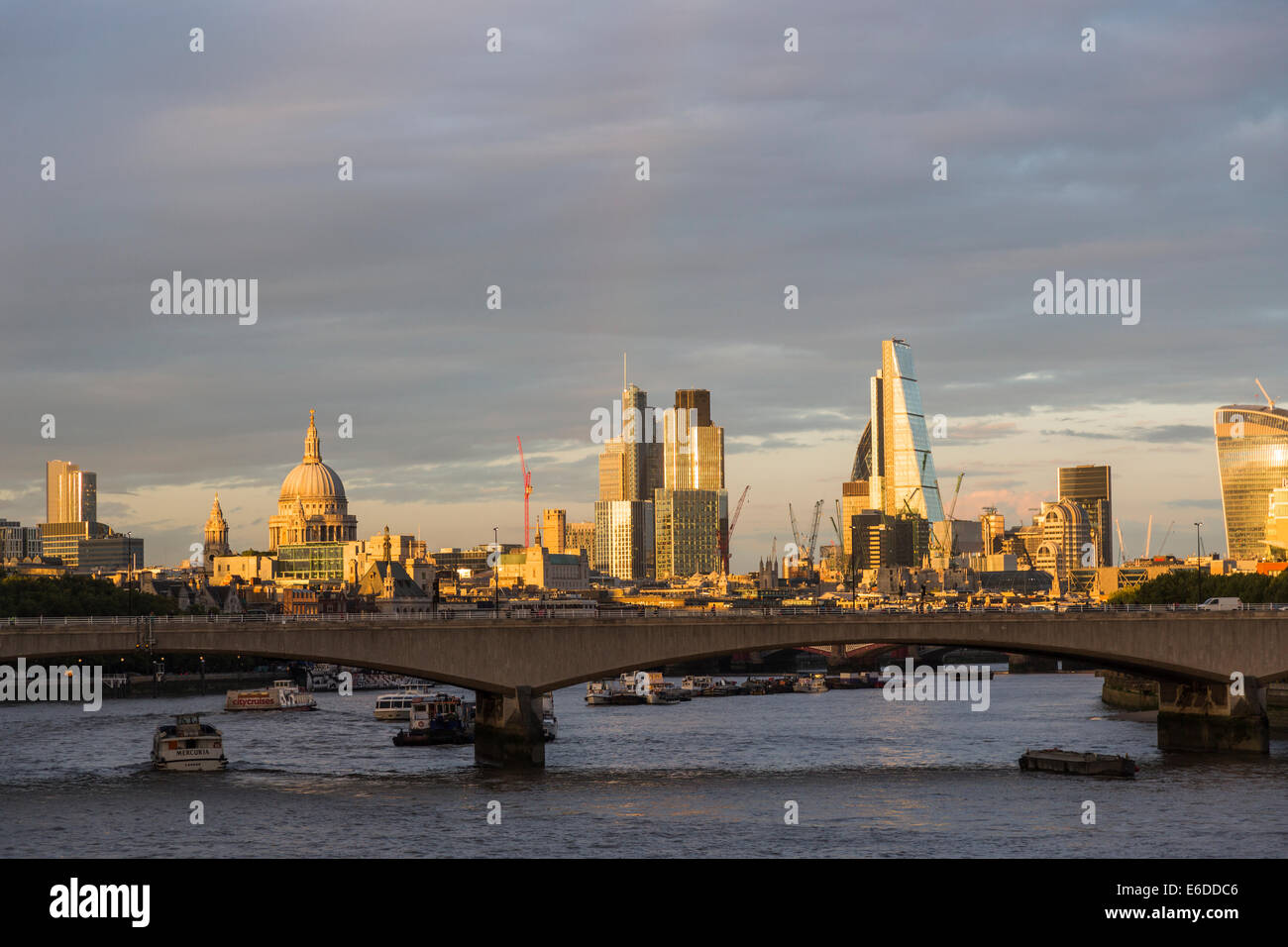 London evening skyline: Waterloo Bridge, River Thames, St Paul's ...