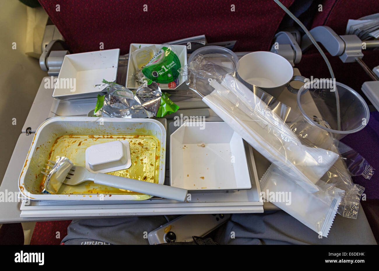Waste packaging left after aircraft meal in flight Miri to London with Malaysia Airlines Stock Photo