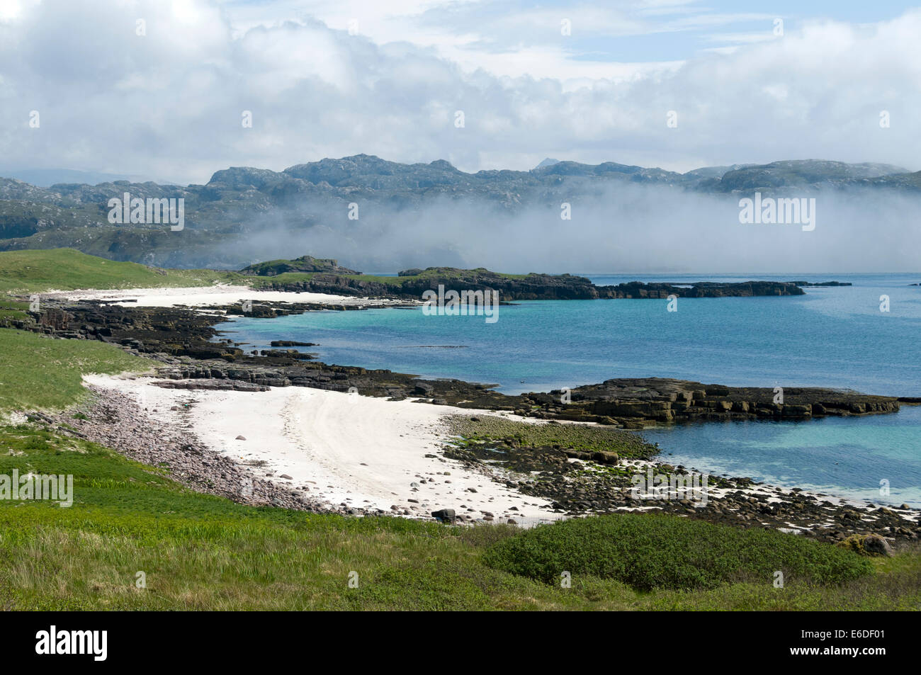 Beaches and sea fog near the southern tip of Handa Island with the mainland beyond, Sutherland, Scotland, UK Stock Photo