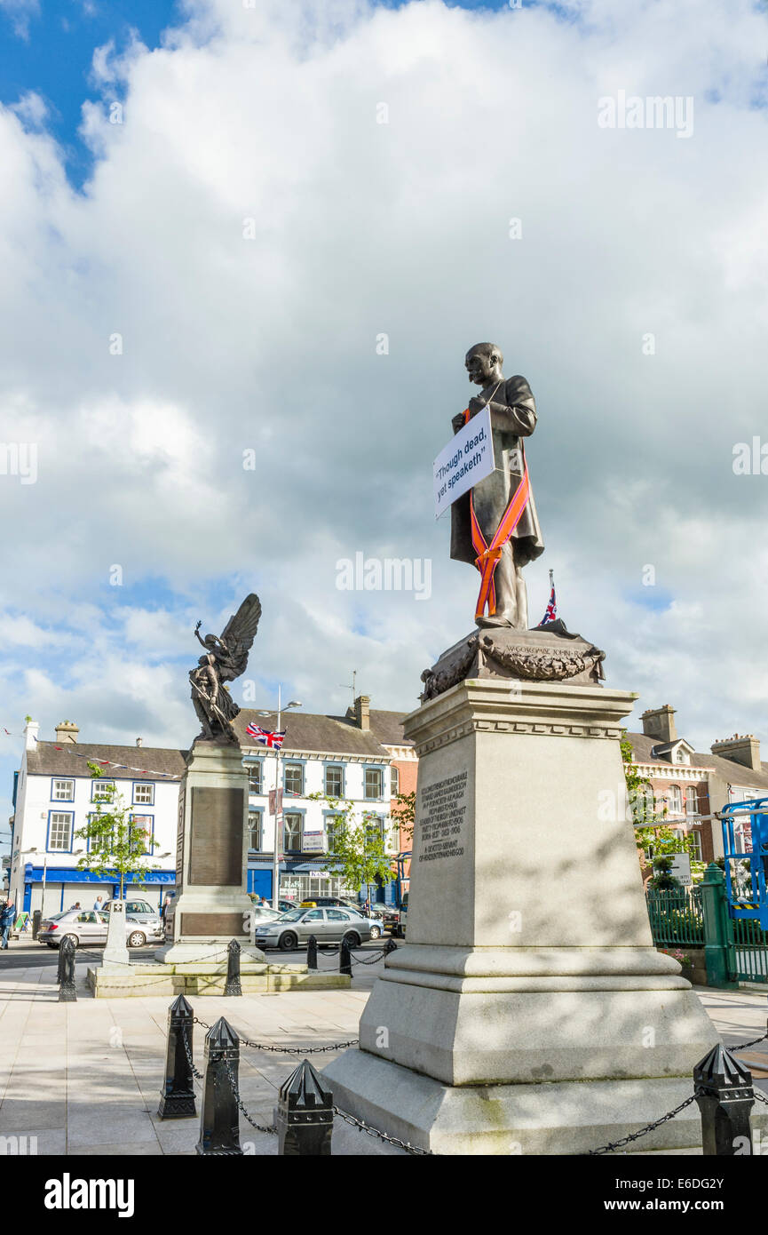 Saunderson statue in Portadown decorates with an Orange Sash, the card reads 'Though dead yet speaketh'. Stock Photo