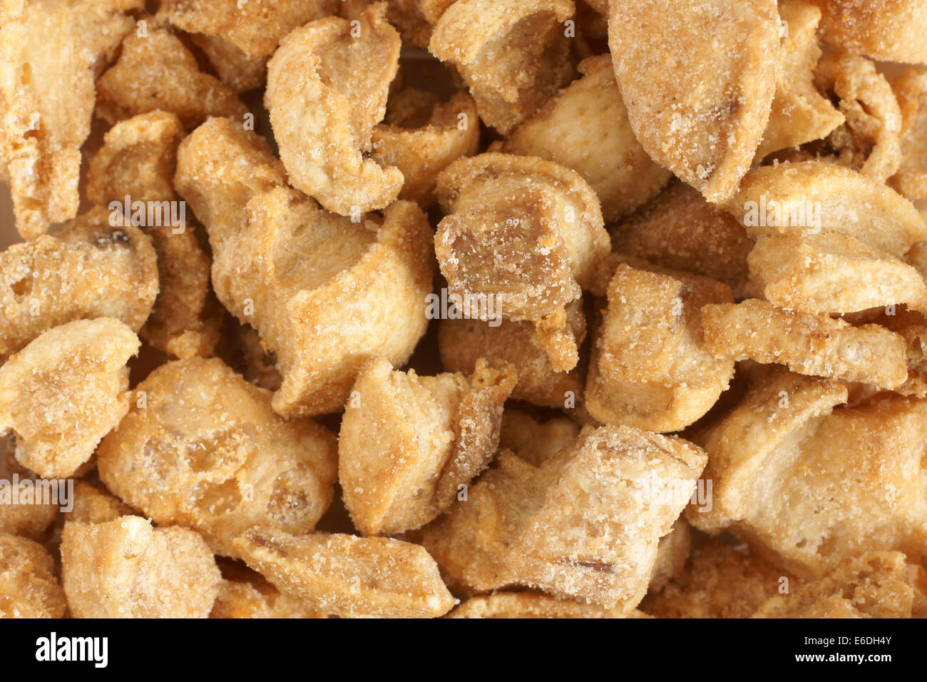 Pork scratchings deep fried pork rinds popular through the world as a