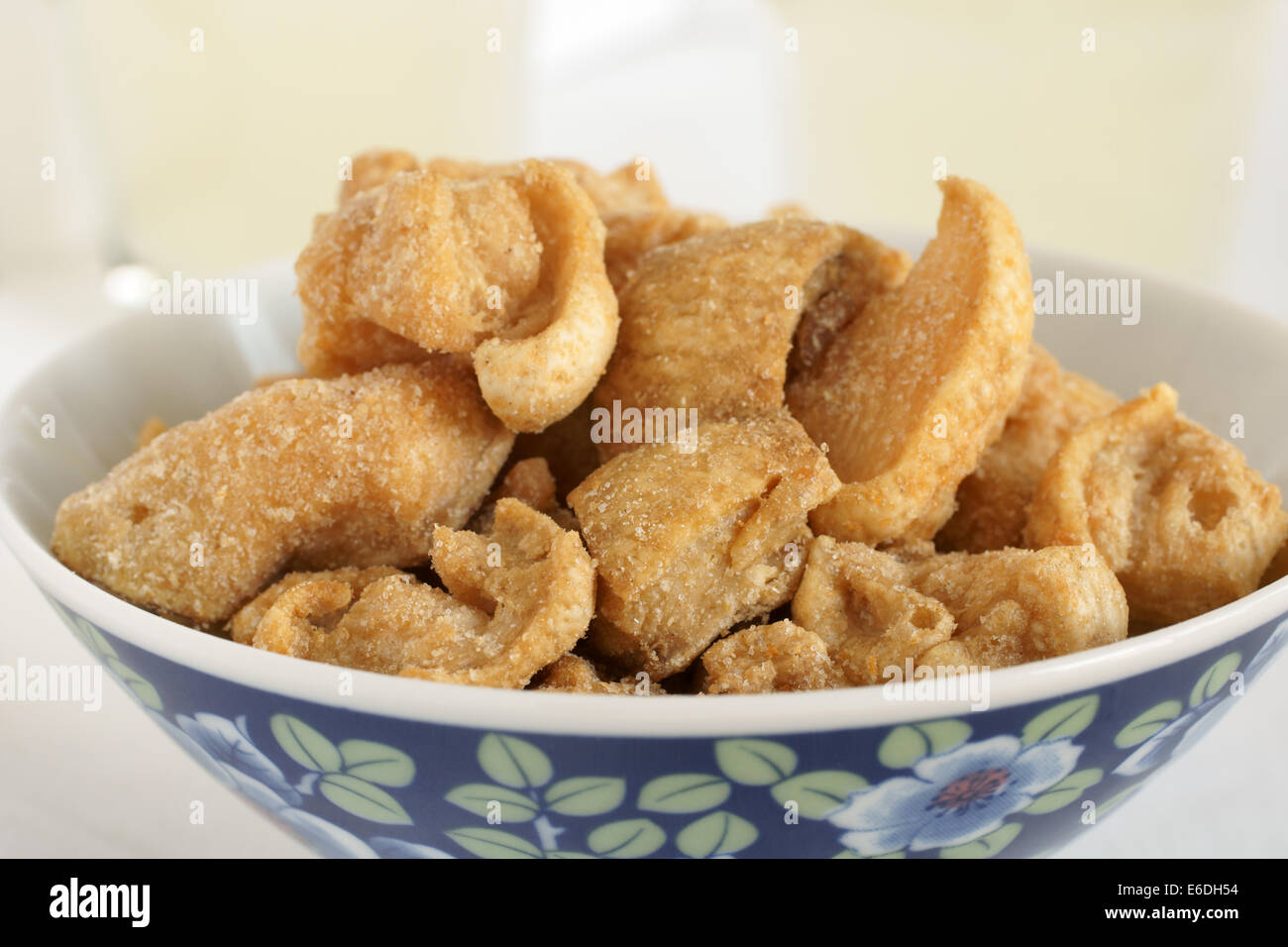 Pork scratchings deep fried pork rinds popular through the world as a