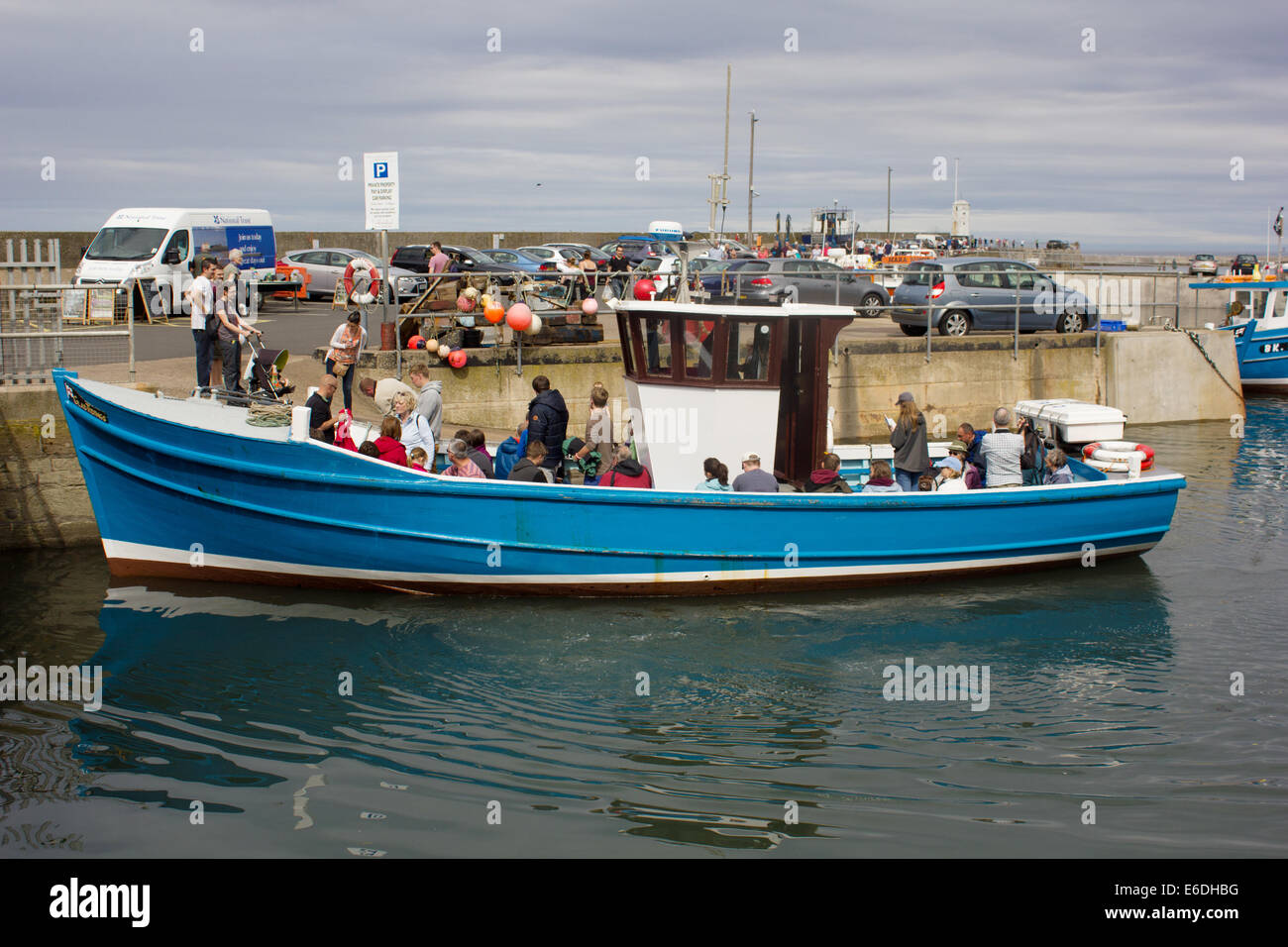 Billy Shiel day trip boat with passengers in Seahouses harbour, Northumberland, England, UK Stock Photo