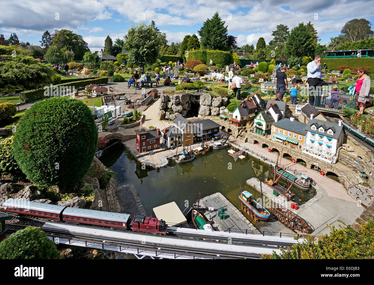 Railway with steam train and harbour with vessels at Beconscot Model