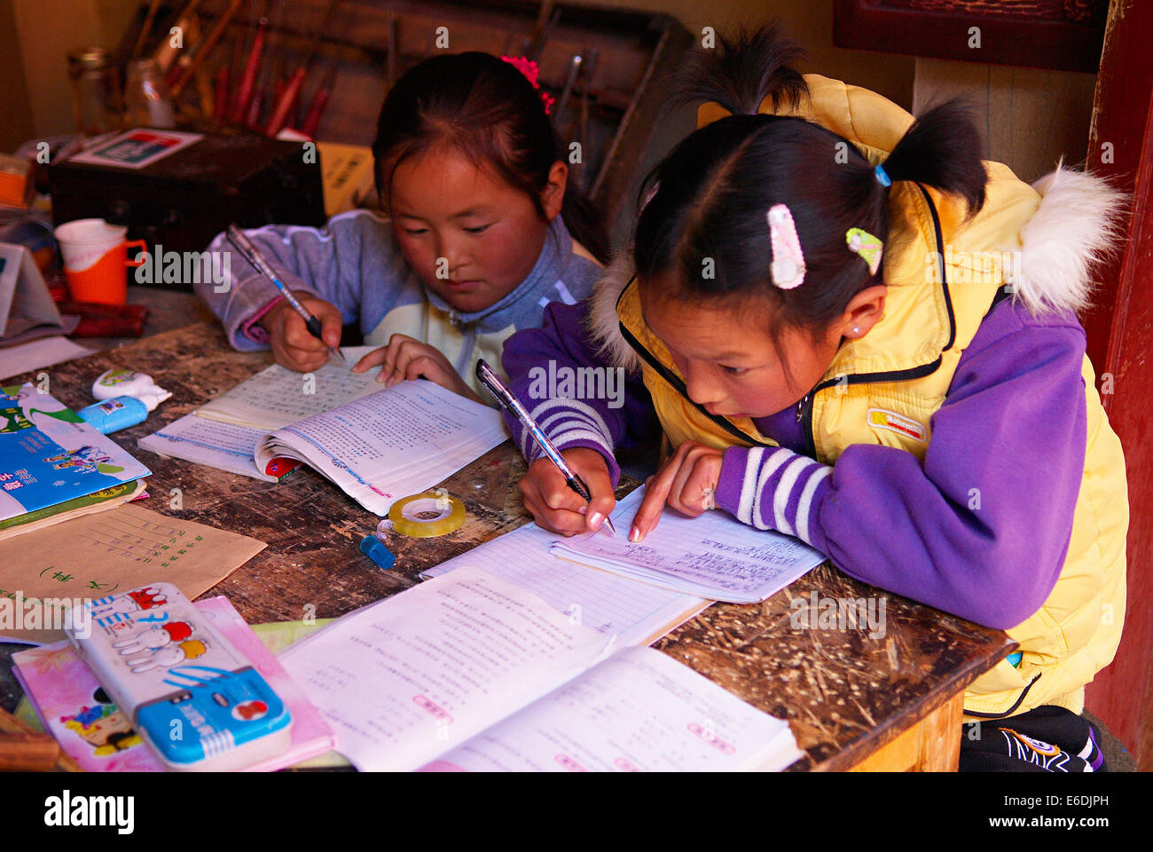 China. Yunnan province. City of Lijiang. UNESCO World Heritage. School girl. Stock Photo