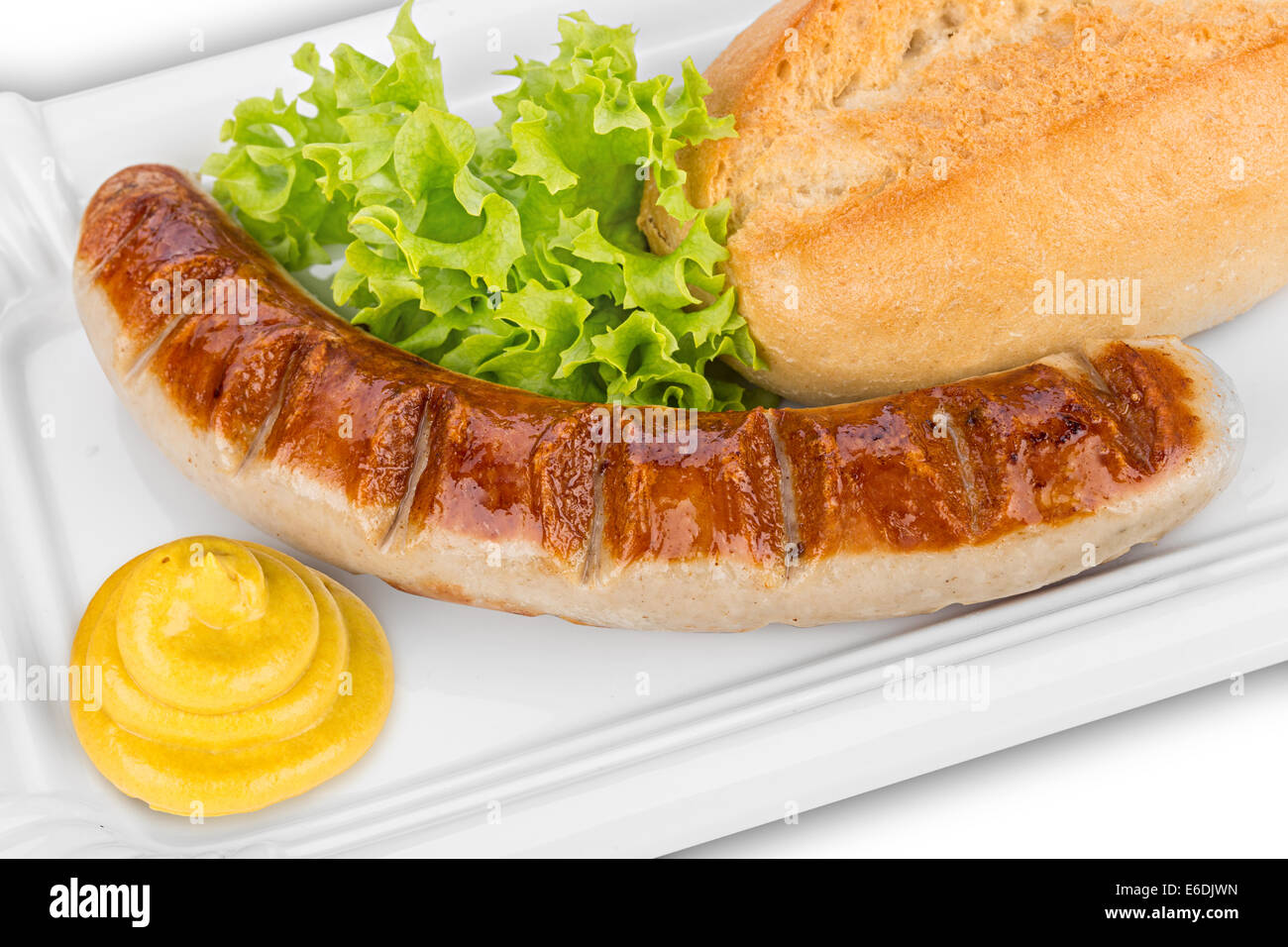 german grilled sausage with mustard and salad Stock Photo Alamy
