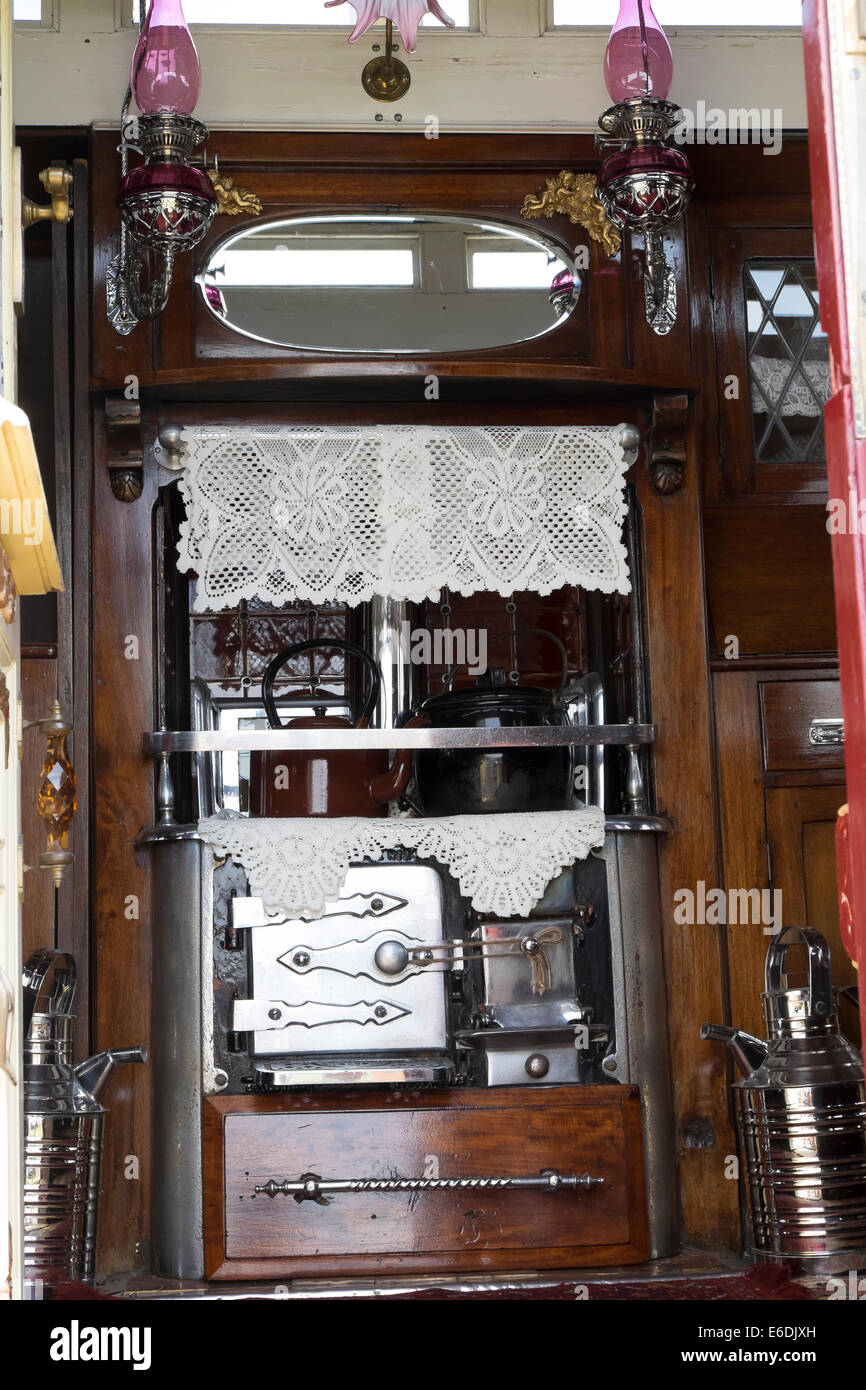 Interior of 1916 vintage showman's living van at show ground for Cambridgeshire Steam Rally and Country Fair England Stock Photo