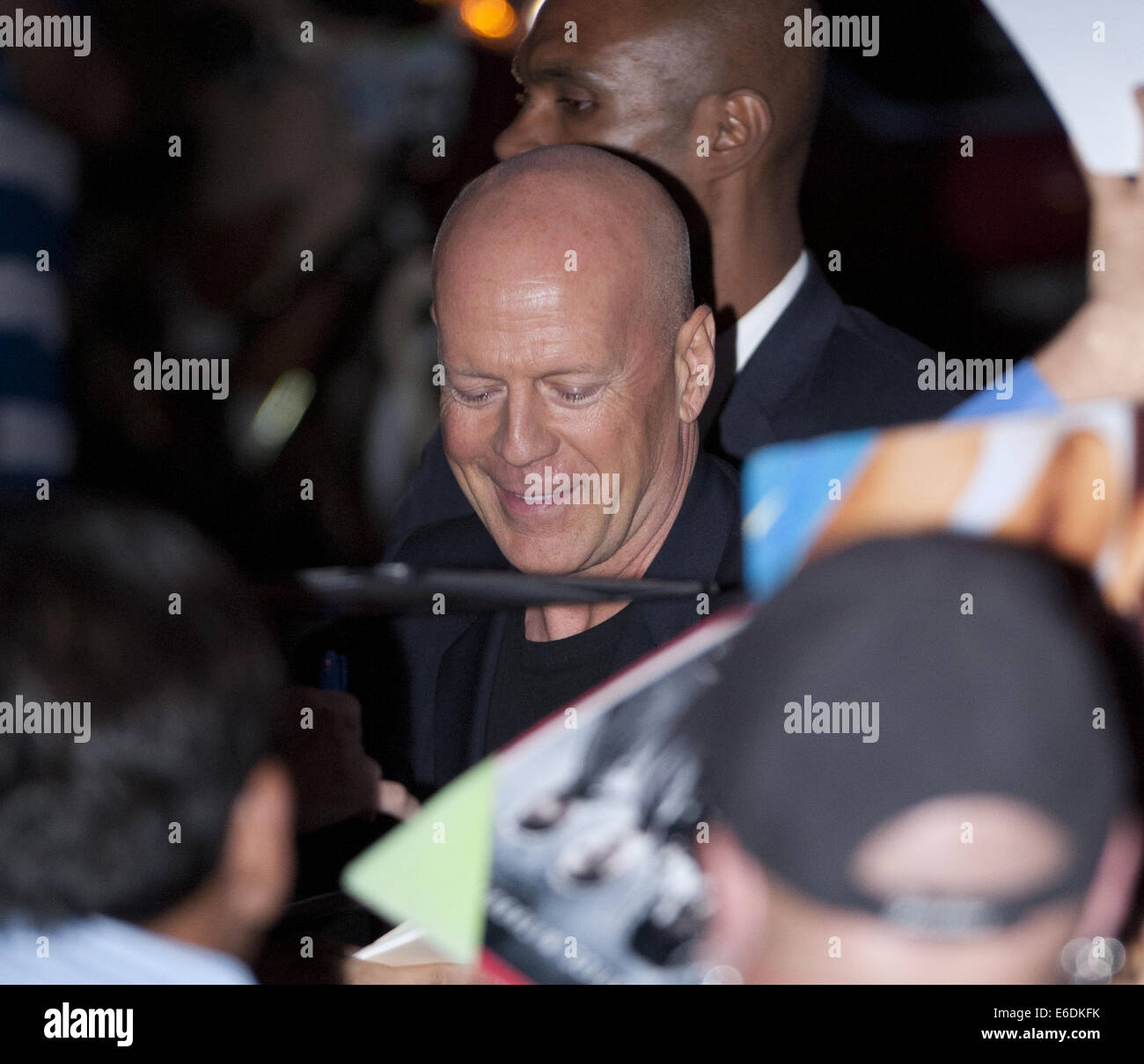 Aug. 19, 2014 - Hollywood, California, U.S - American actor Bruce Willis arrives at the 'Sin City: A Dame To Kill For' Hollywood Premiere at the TCL Chinese Theatre on Monday August 19, 2014.  The actor greeted fans, signing autographs and taking photos before making it onto the red carpet on Tuesday. (Credit Image: © David Bro/ZUMA Wire) Stock Photo