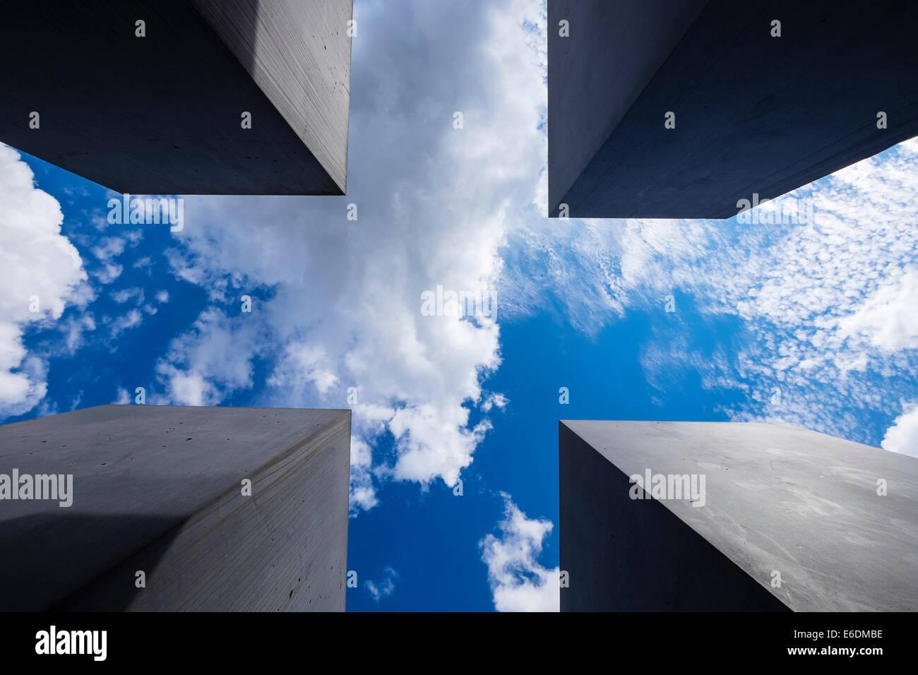 View looking up of blocks at  Holocaust Memorial (Memorial to the Murdered Jews of Europe) in Berlin Germany Stock Photo