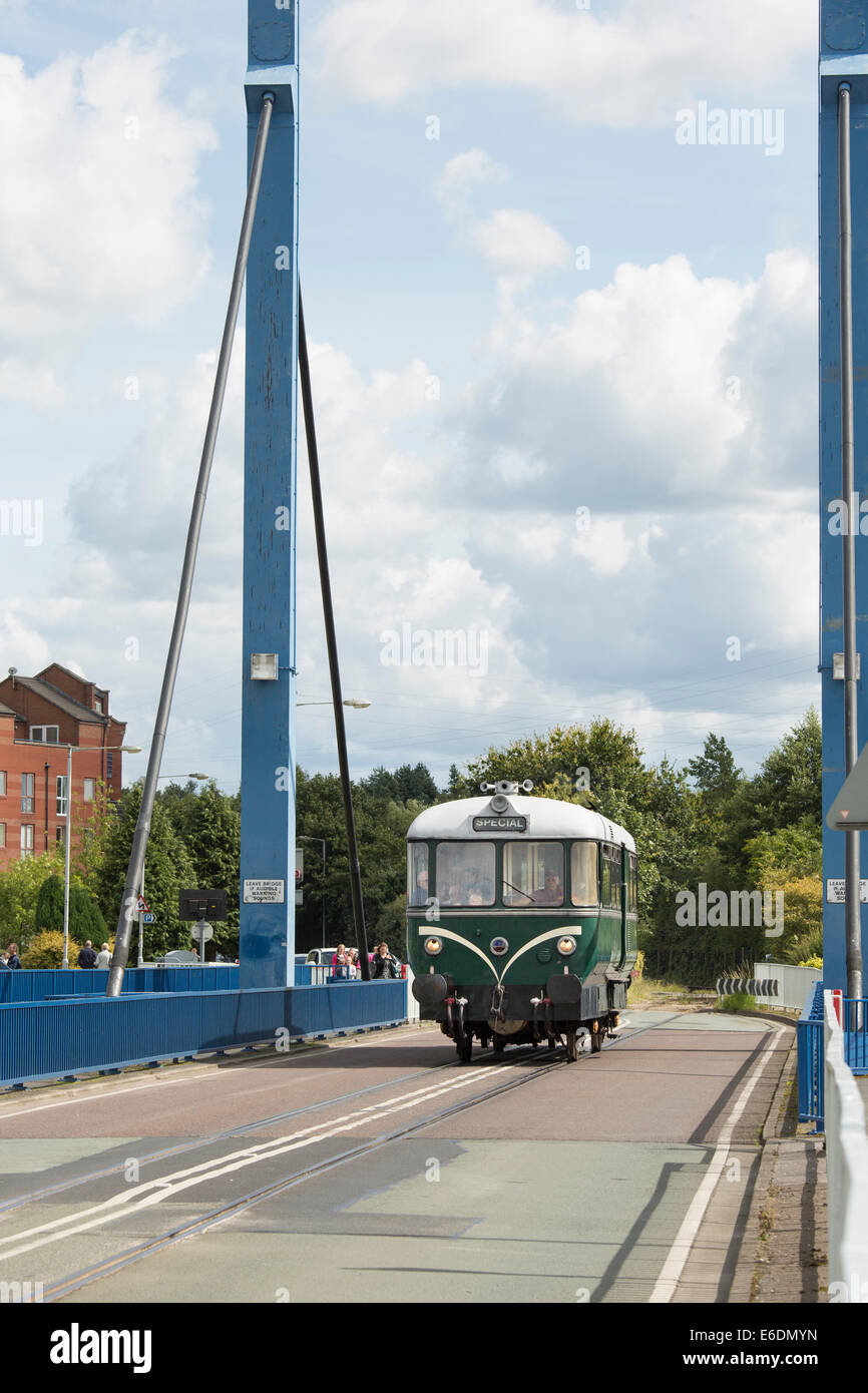 Diesel Railbus built in Germany in 1958 for British Railways crossing the swing bridge, Preston Docklands Stock Photo