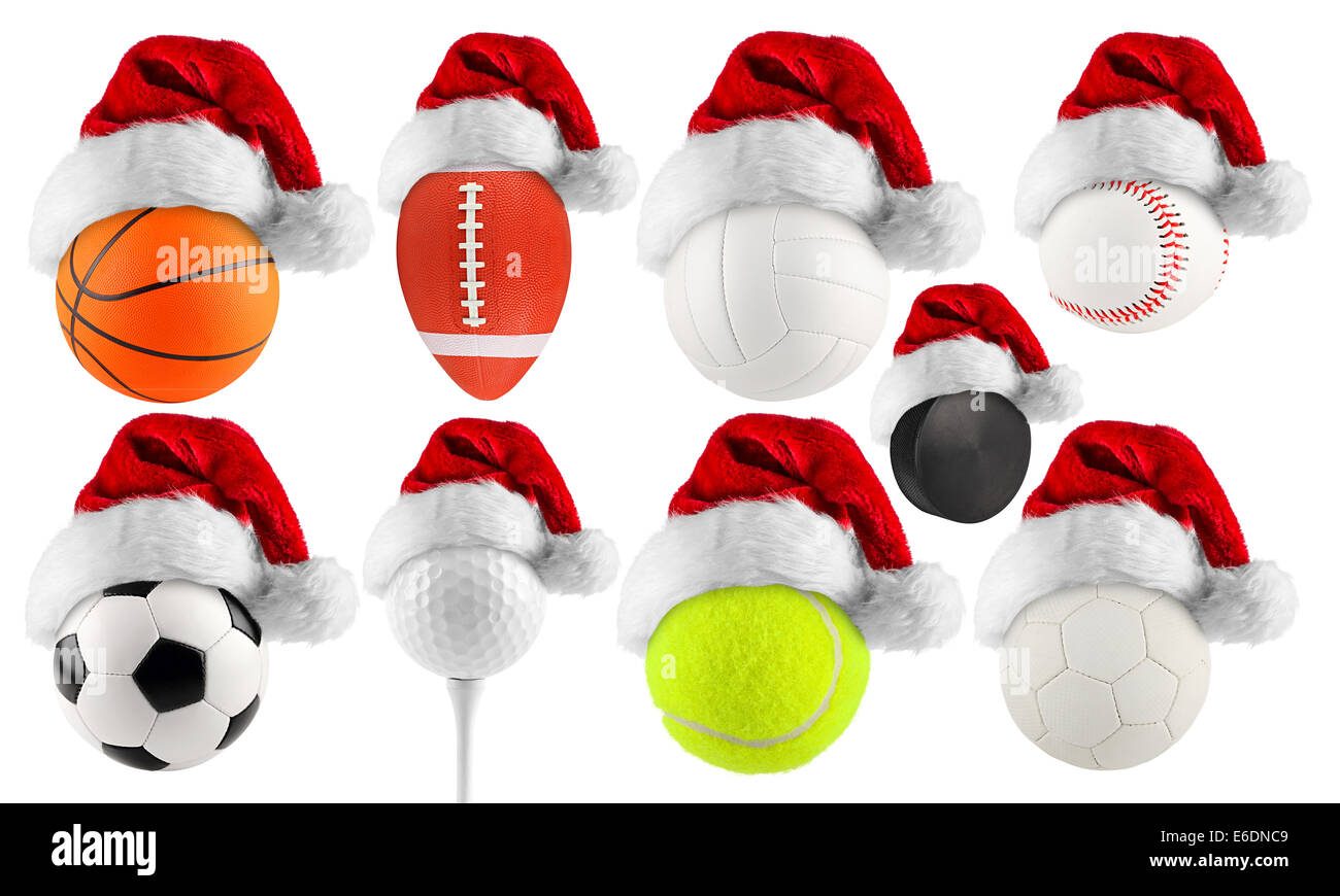 set of santa hats on different balls of sport Stock Photo