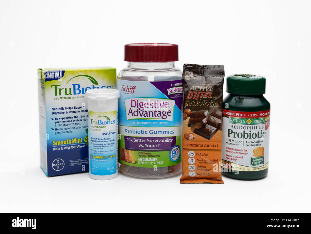 Variety of probiotic supplements including pills, chewable tablets, gummies and chocolate Stock Photo