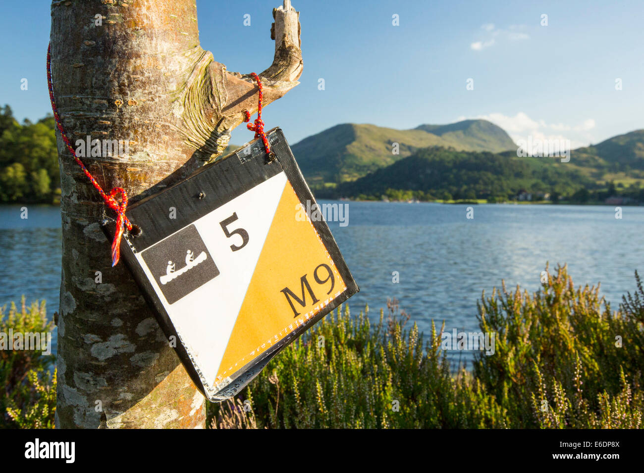 A kayak orienteering sign on Ullswater in the Lake District, UK. Stock Photo