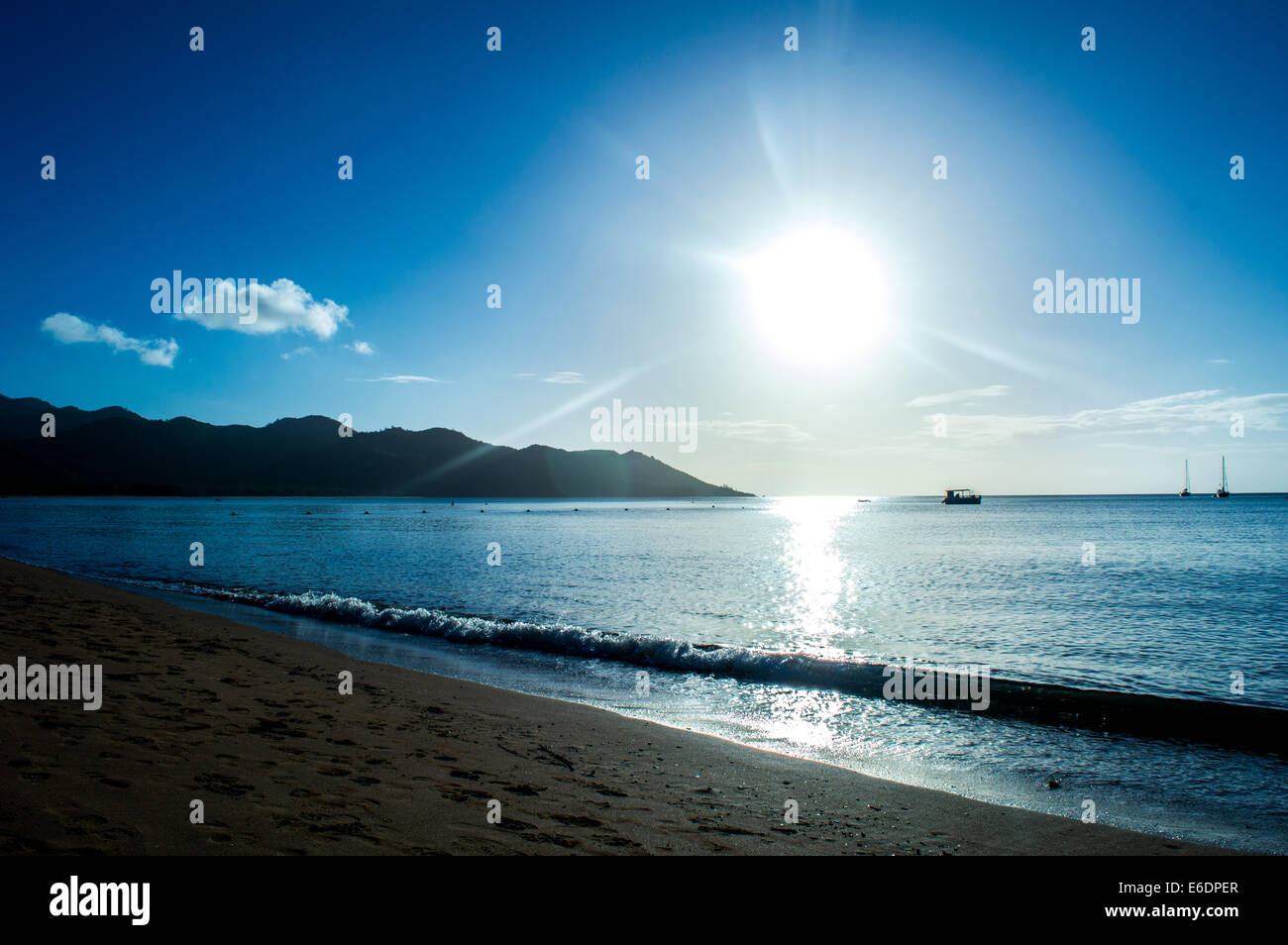 Sun shining over the beach on the beautiful magnetic island. Stock Photo