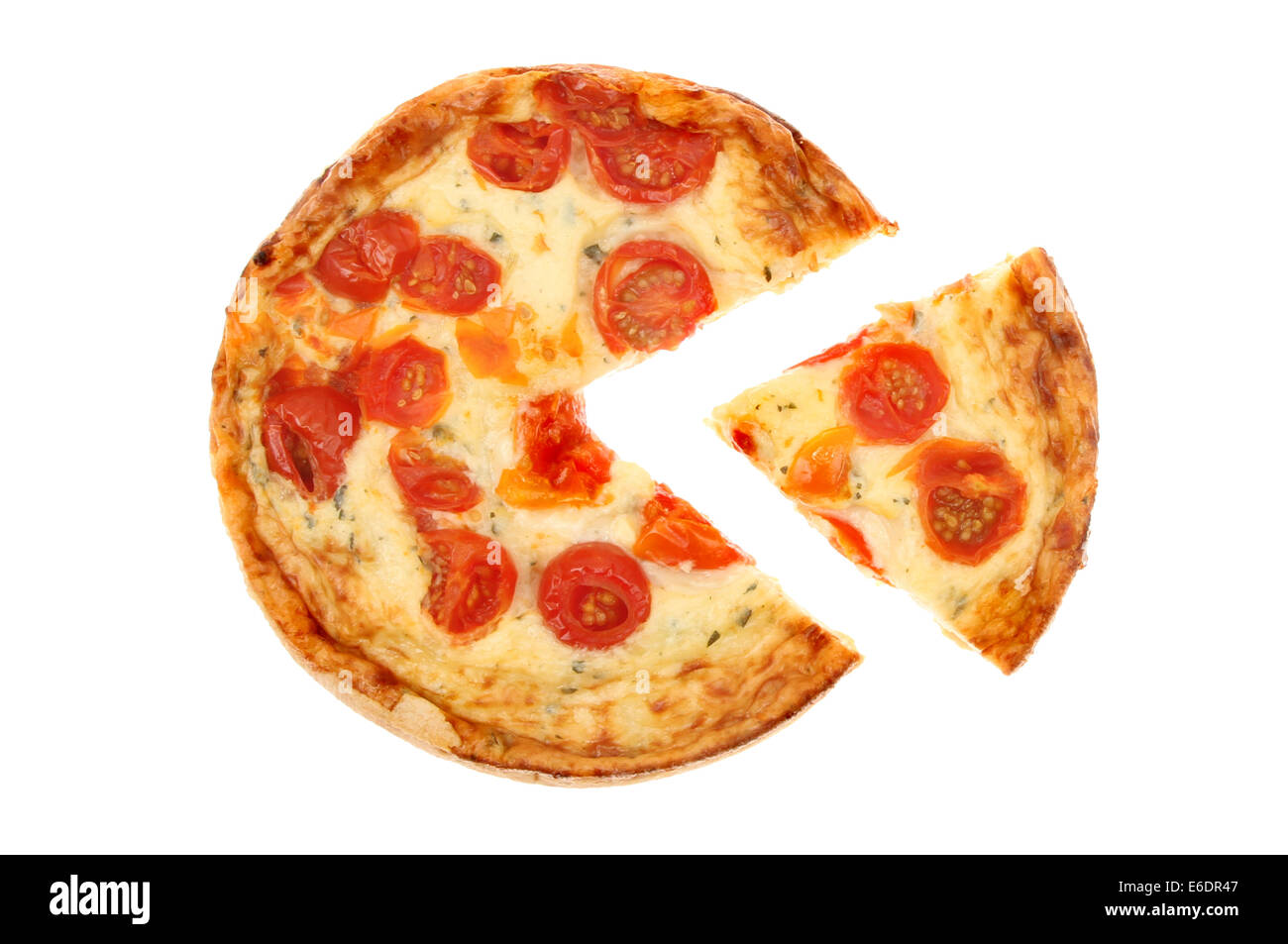 Mozzarella cheese, tomato and basil quiche with a slice cut out isolated against white Stock Photo
