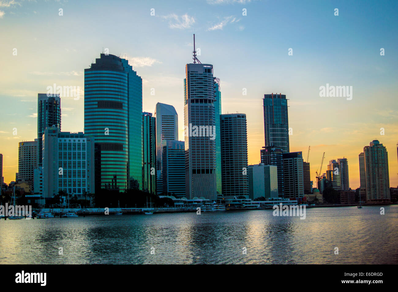 Sunset behind the stunning Brisbane Skyline along the riverside. Stock Photo