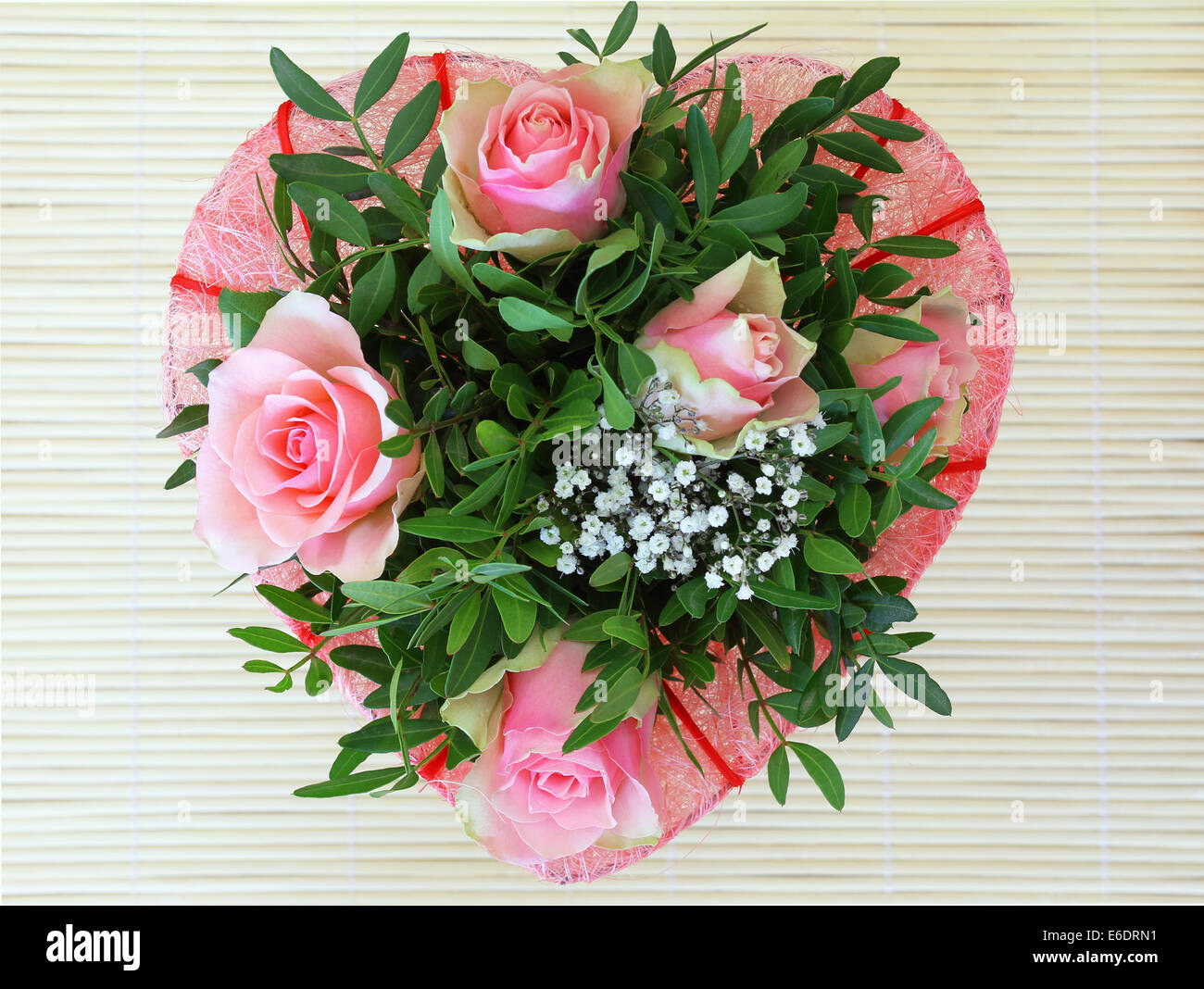 Heart shaped pink roses bouquet Stock Photo - Alamy