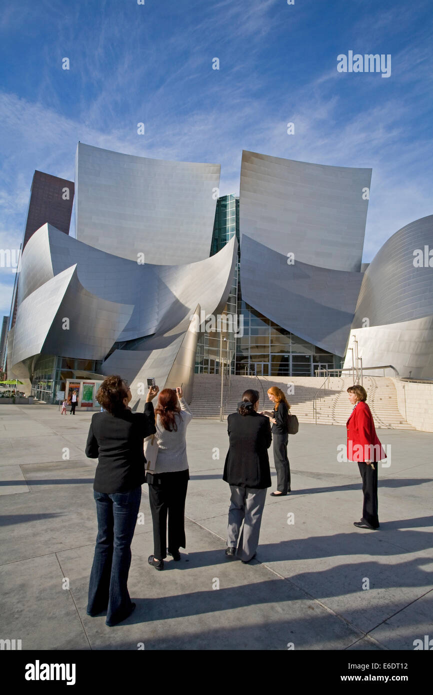 Tourists at Walt Disney Concert Hall by Frank Gehry, Los Angeles Music Center, Grand Avenue, Downtown LA, California, USA. Stock Photo
