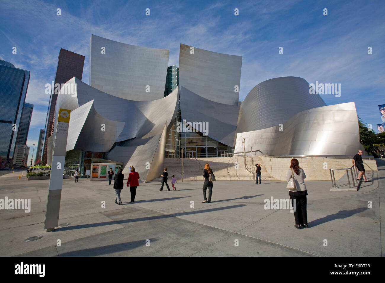 Tourists at Walt Disney Concert Hall by Frank Gehry, Los Angeles Music Center, Grand Avenue, Downtown LA, California, USA. Stock Photo