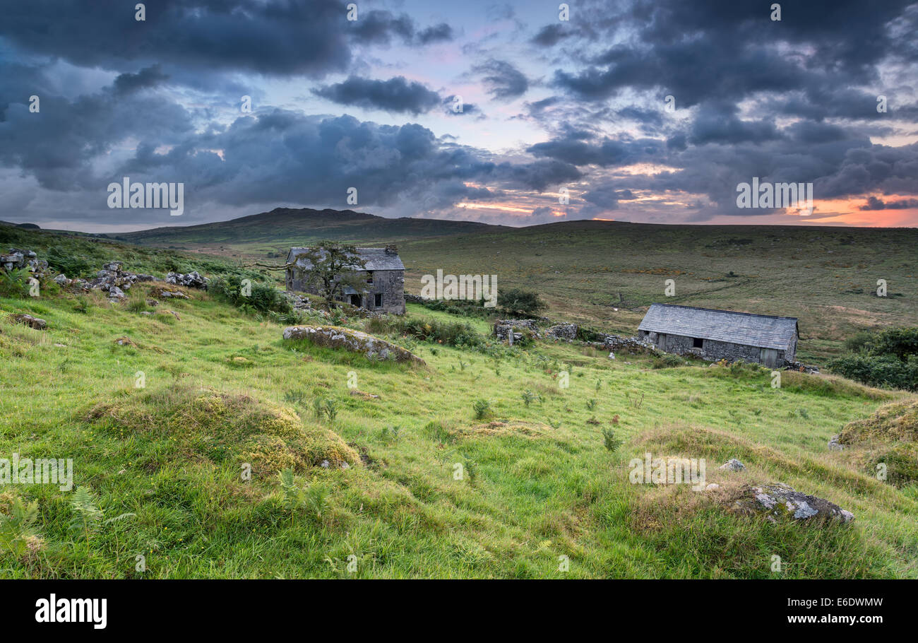 Derelict farmhouse on Bodmin Moor with Brown Willy behind the highest
