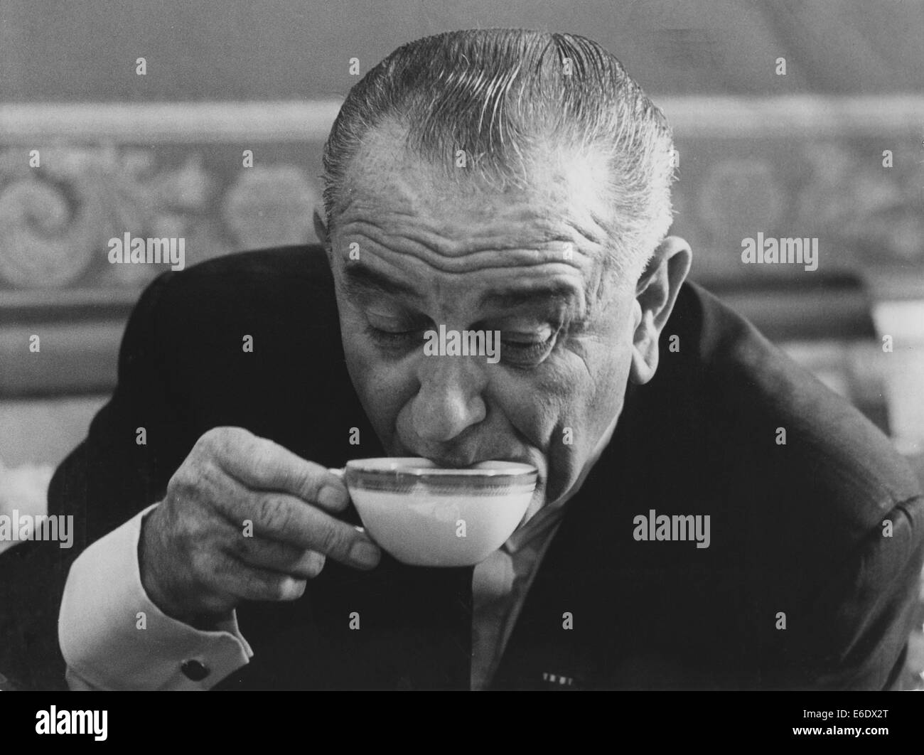 U.S. President Lyndon B. Johnson Drinking Cup of Tea, 1965 Stock Photo