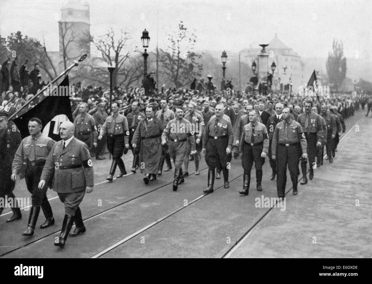 Adolf Hitler, Julius Streicher (foreground, R), and Hermann Goering (L of Hitler) Retrace Steps of 1923 Beer Hall Putsch, Stock Photo