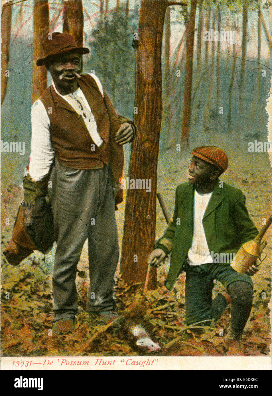 African-American Man and Boy with Snared Opossum, Series 13931, 'De 'Possum Hunt - Caught', USA, Hand-Colored Postcard, circa Stock Photo