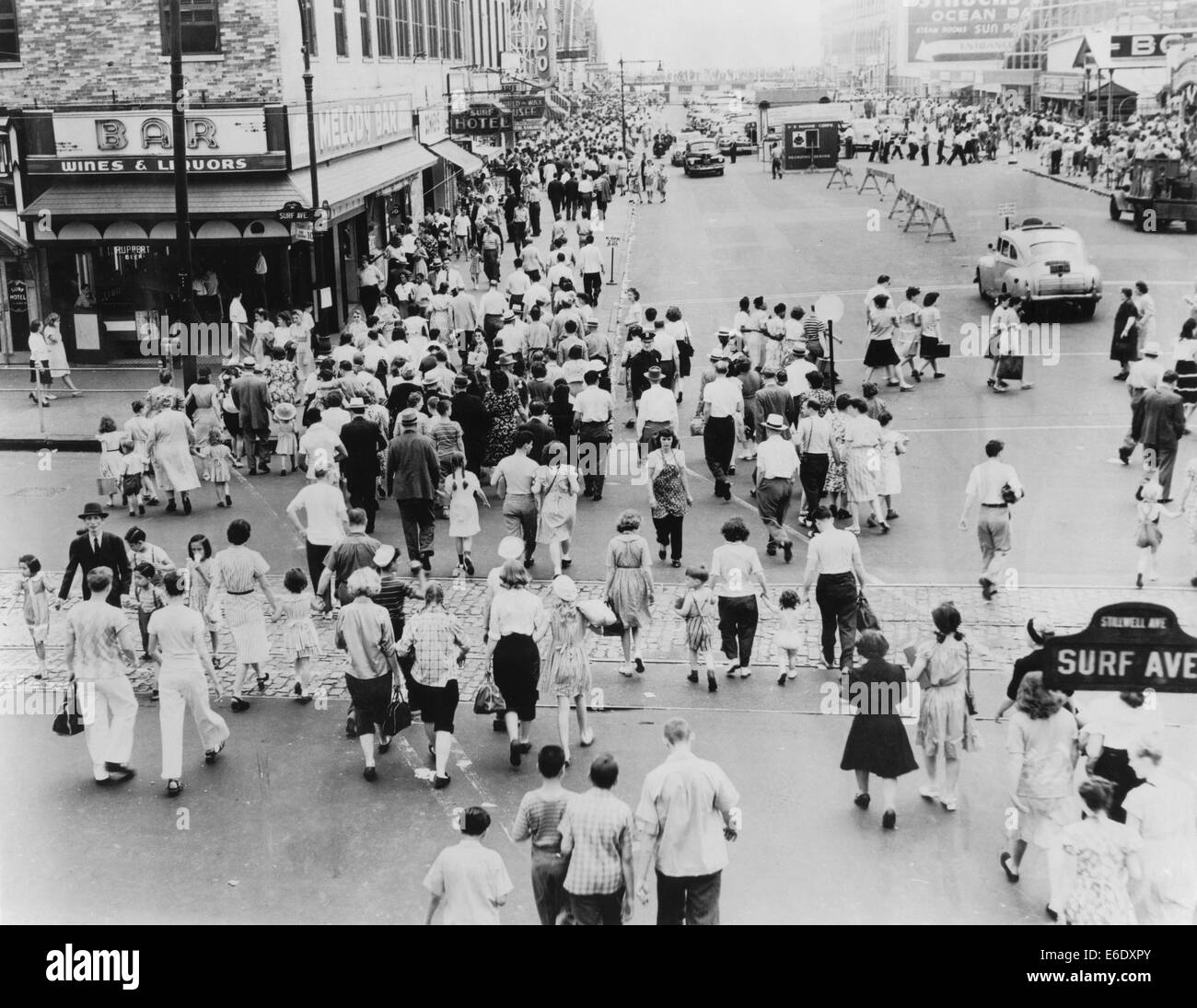 Crowded Street Scene at Intersection of Surf and Stillwell Avenues, Coney Island, New York City, USA, 1944 Stock Photo