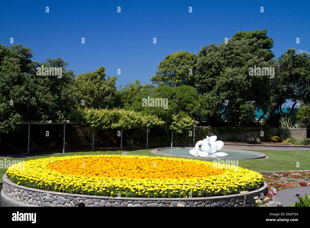 Round flower display and public art along the Marine Parade at Napier in the Hawke's Bay Region, North Island, New Zealand. Stock Photo