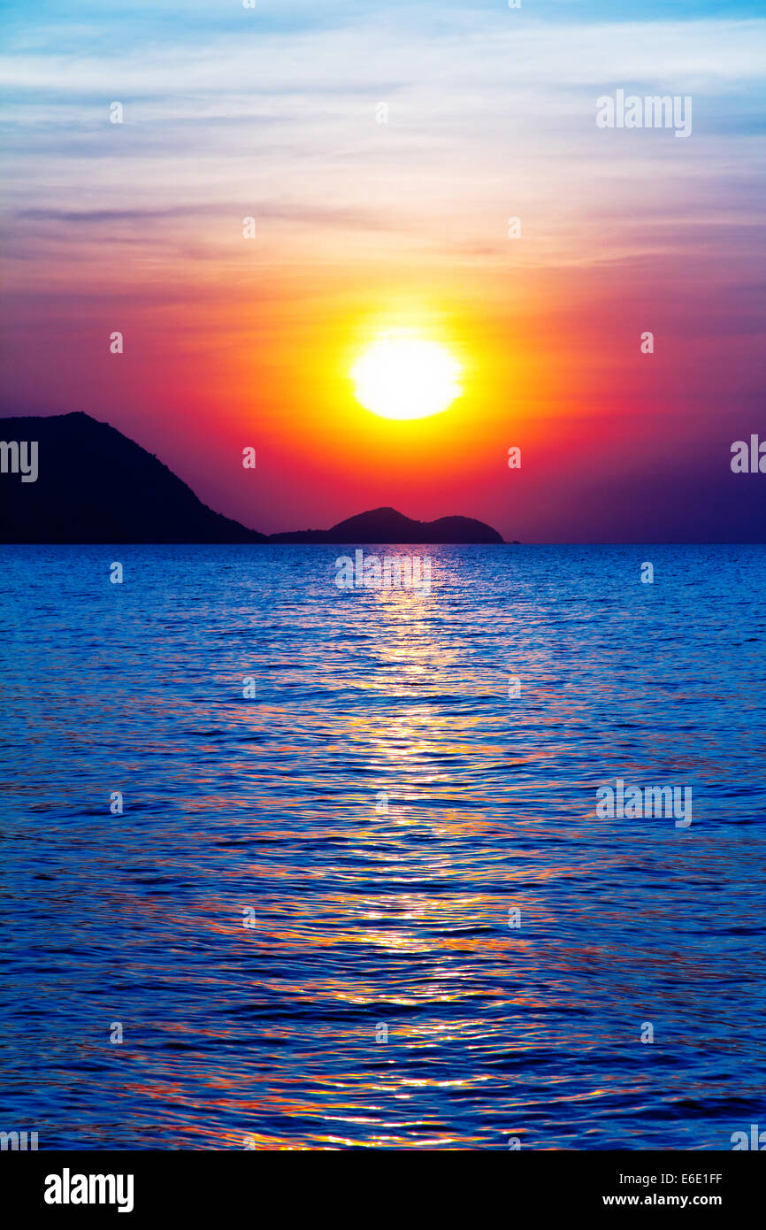 Beautiful sunset on the beach Stock Photo - Alamy