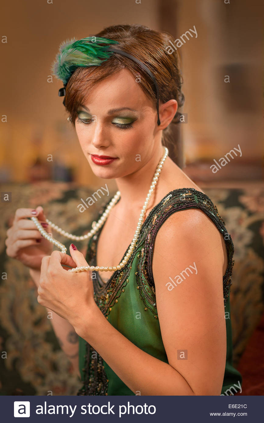 Head Shot Of A Woman With A 1920 S Hair Style And Wearing A