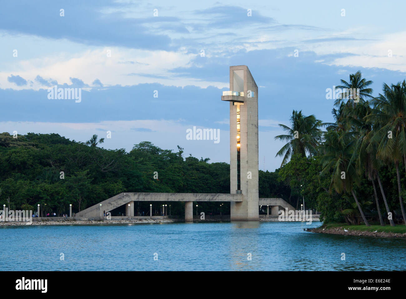 The lookout tower of the Lago de Ilusiones reflects the sunset in Villahermosa, Tabasco, Mexico. Stock Photo