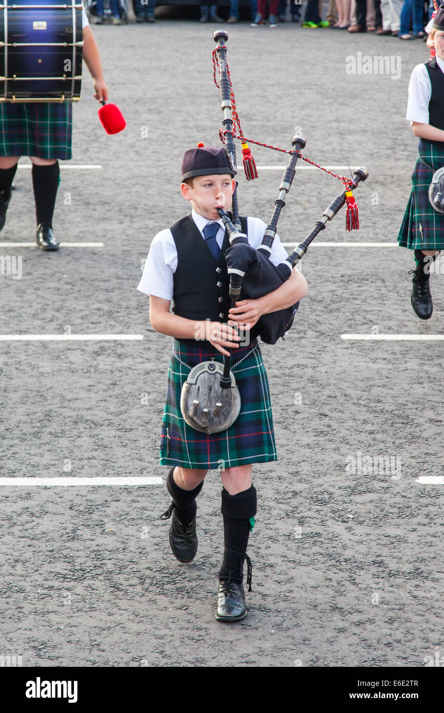 ULLAPOOL, SCOTLAND JULY 17 Bagpipes' parade at local Highland Games