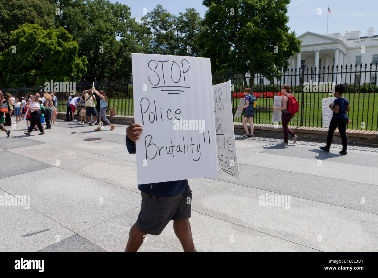 Man holding sign to end police brutality - Washington, DC USA Stock Photo