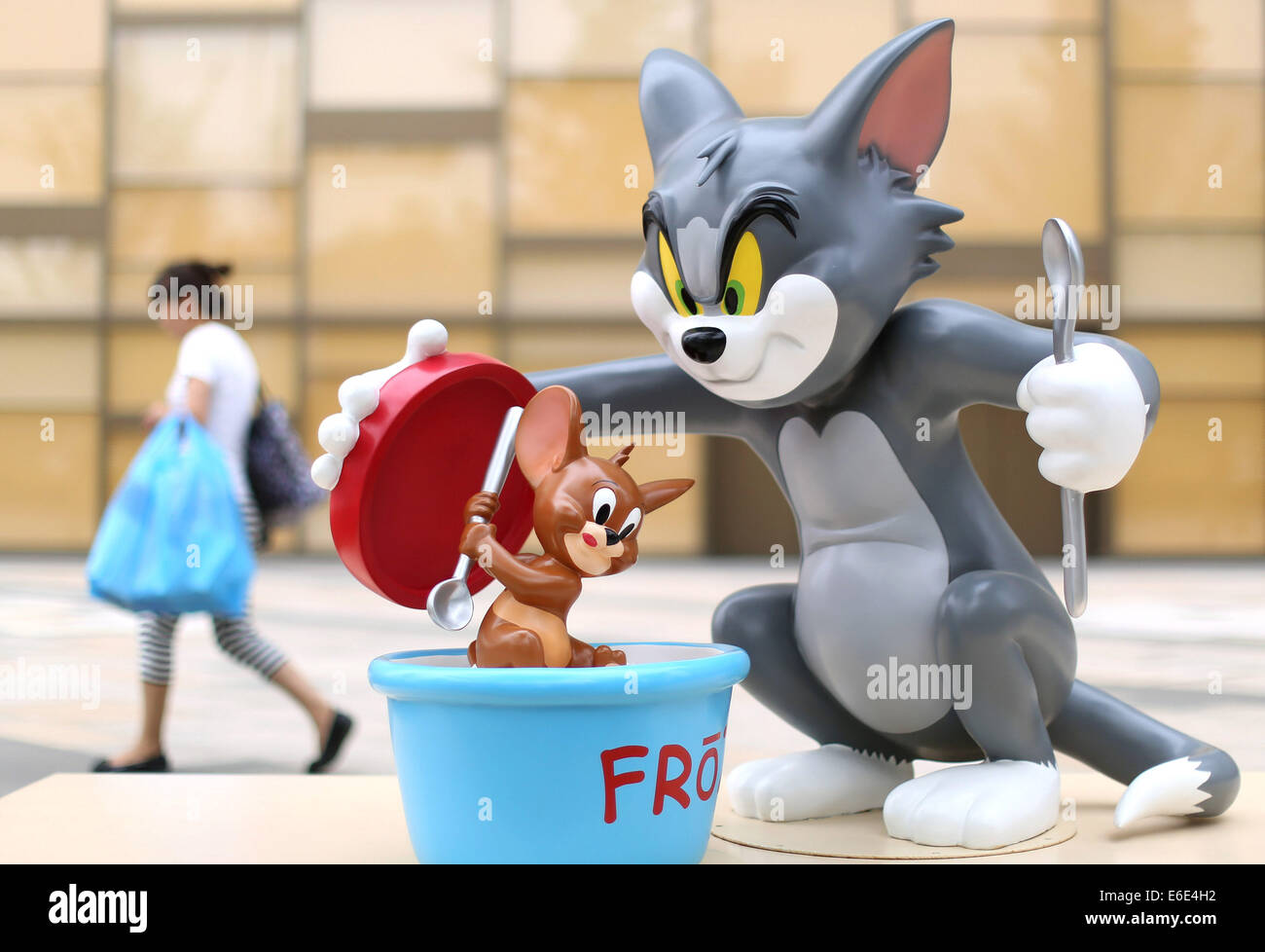Shenyang, China's Liaoning Province. 22nd Aug, 2014. Photo taken on Aug. 22, 2014 shows models of Metro-Goldwyn-Mayer cartoon characters Tom and Jerry outside a shopping mall in Shenyang, capital of northeast China's Liaoning Province, Aug. 22, 2014. Credit:  Yao Jianfeng/Xinhua/Alamy Live News Stock Photo