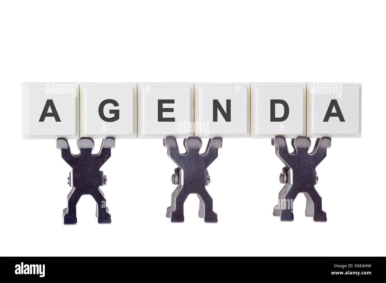 Figurine with the word AGENDA isolated on white background Stock Photo