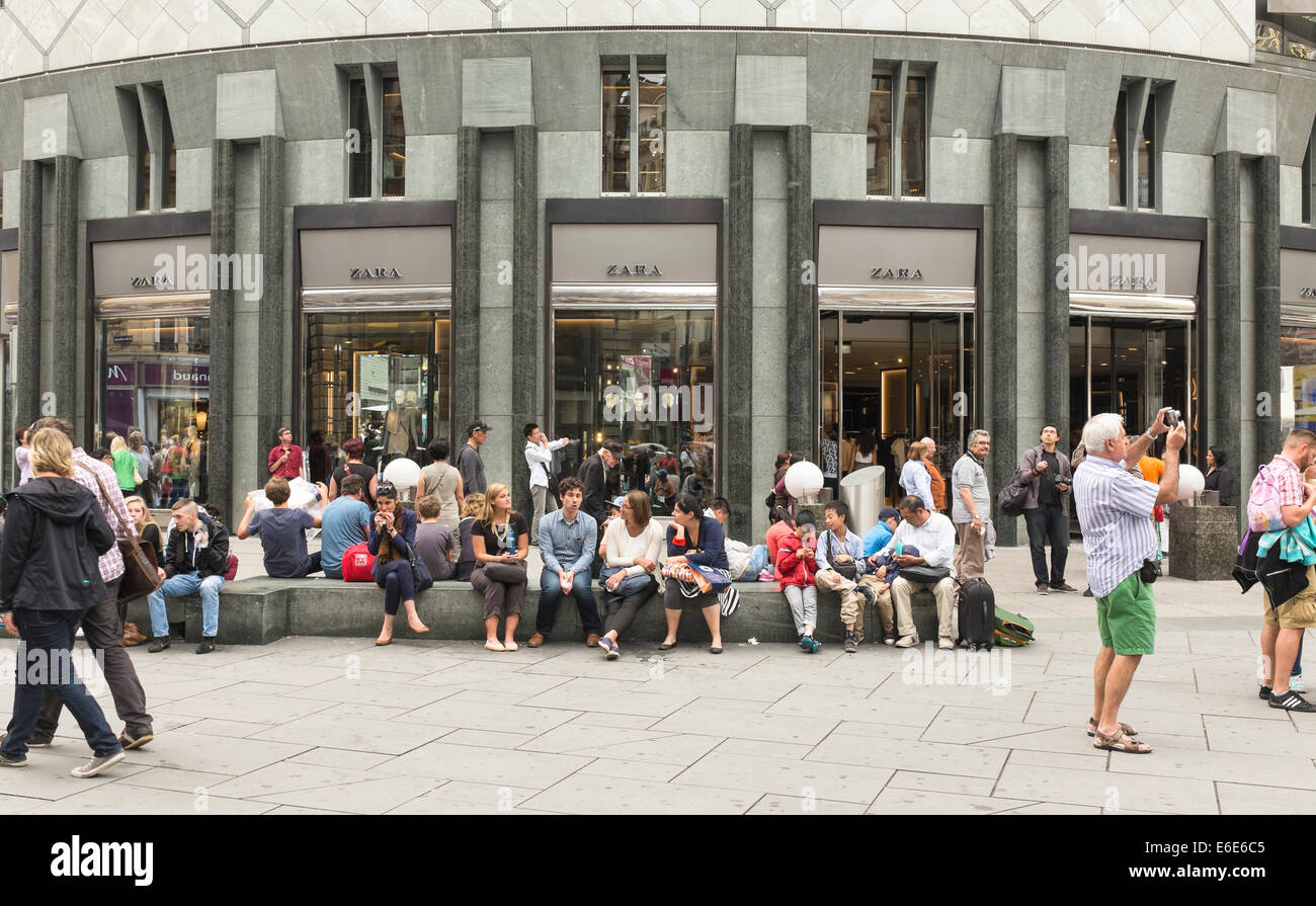 people resting in front of Zara shop, Stephansplatz, Vienna Stock Photo