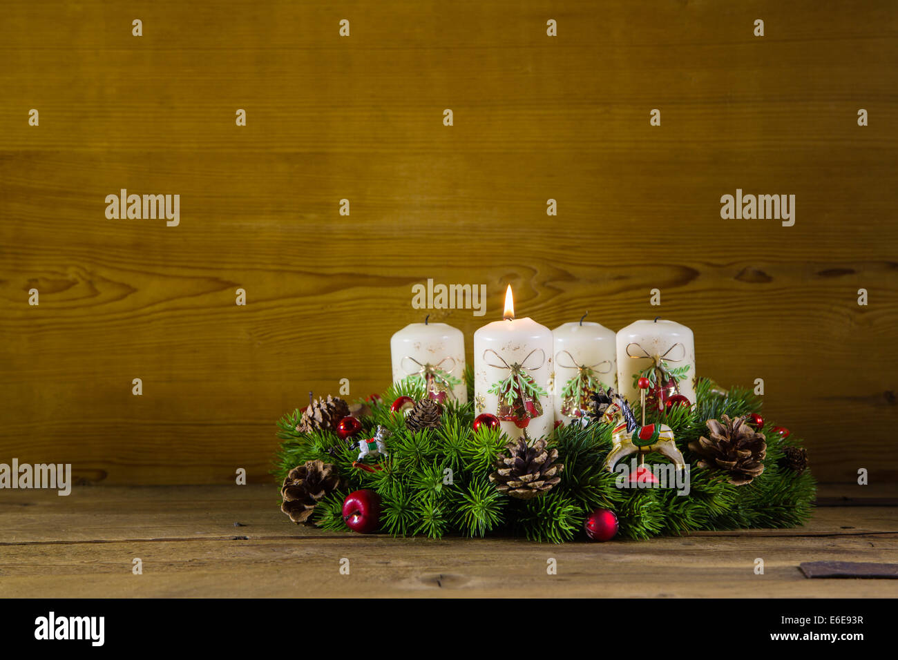 Natural advent crown with one burning white candle Stock Photo Alamy