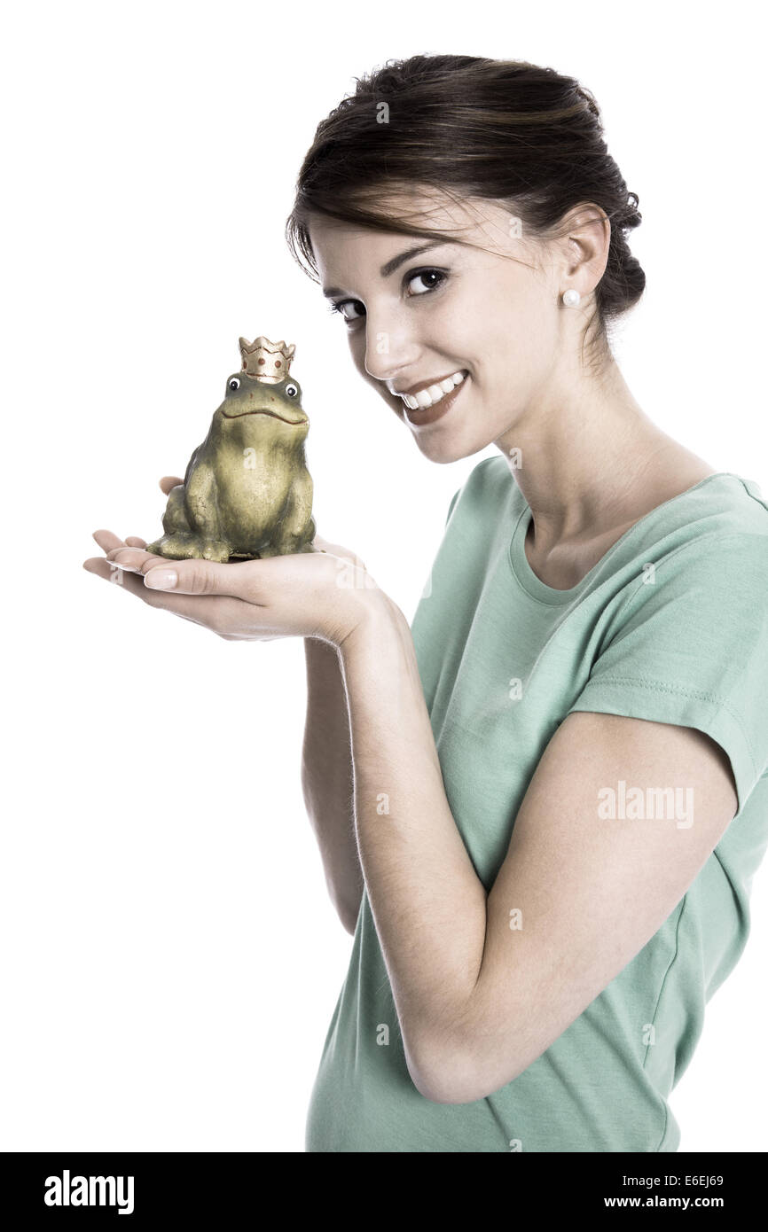 Story of frog king - young isolated woman. Concept for singles, wedding or valentine's day. Stock Photo