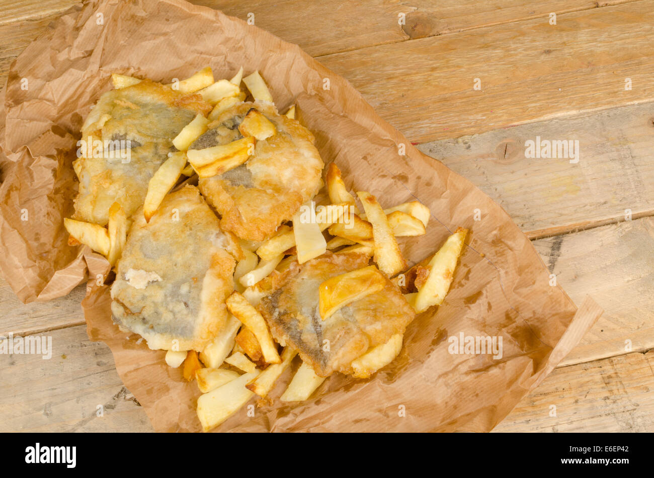 Traditional homemade fish and chips in a paper wrap Stock Photo ...