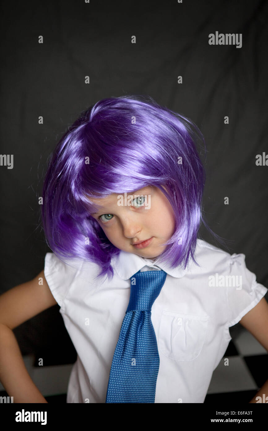 Child with sarcastic and defiant facial expression. Stock Photo