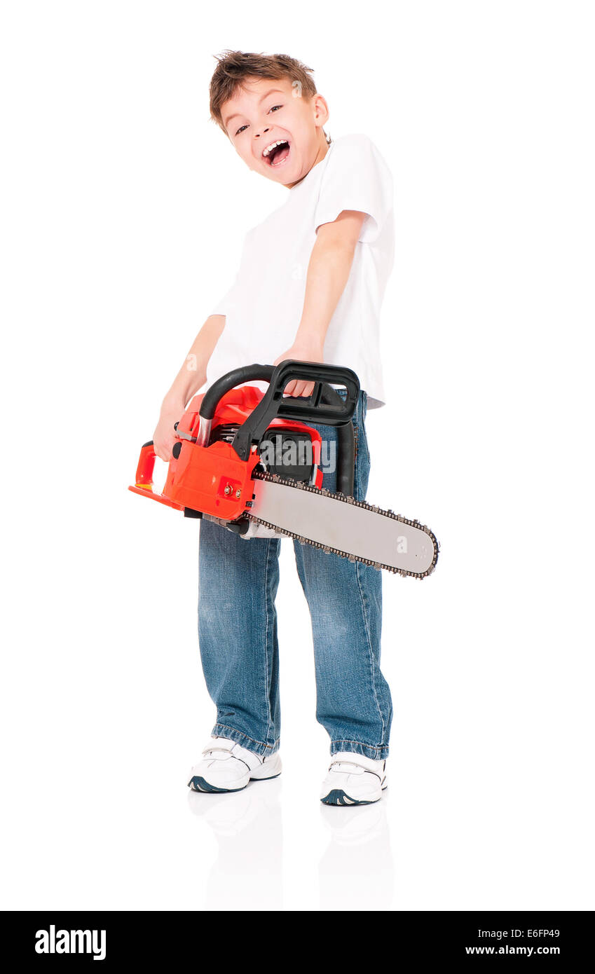 Boy with chainsaw Stock Photo