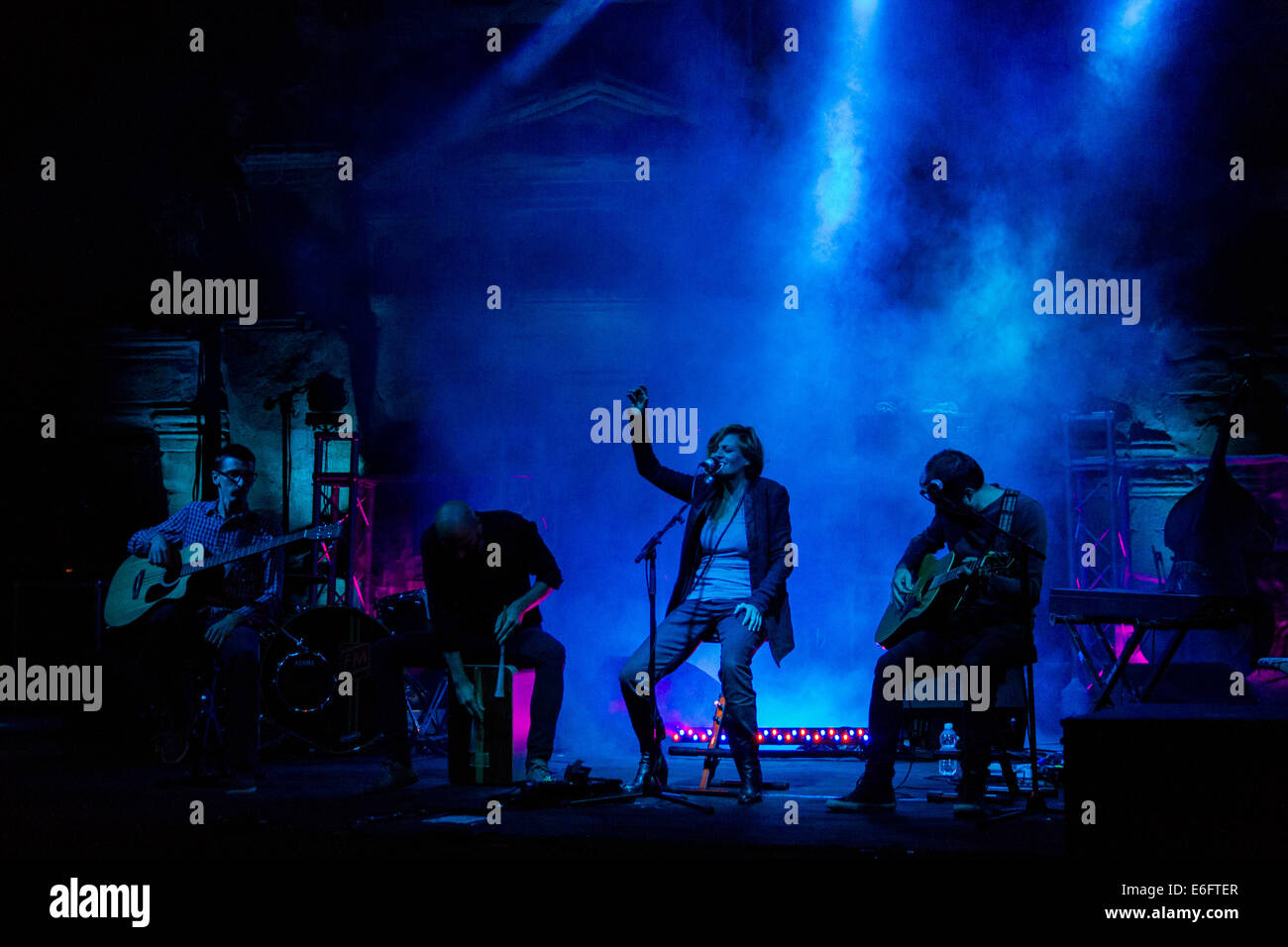 Cumiana, Italy. 21st Aug, 2014. The Italian singer, Irene Grandi perfoms acoustic concert at Zoom. Credit:  Elena Aquila/Pacific Press/Alamy Live News Stock Photo