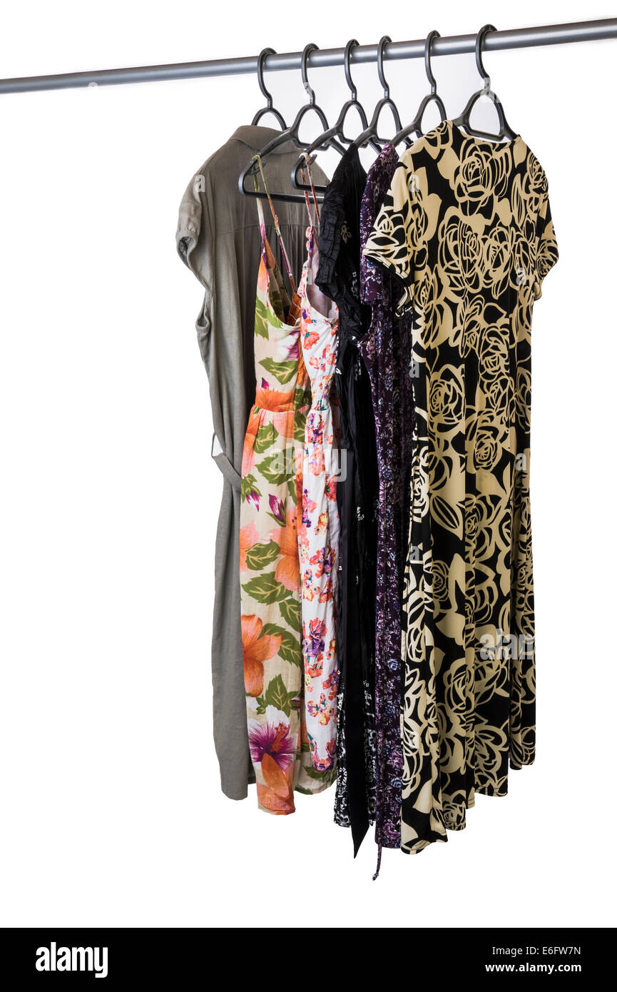 Summer dresses hanging on a dress rail. Stock Photo