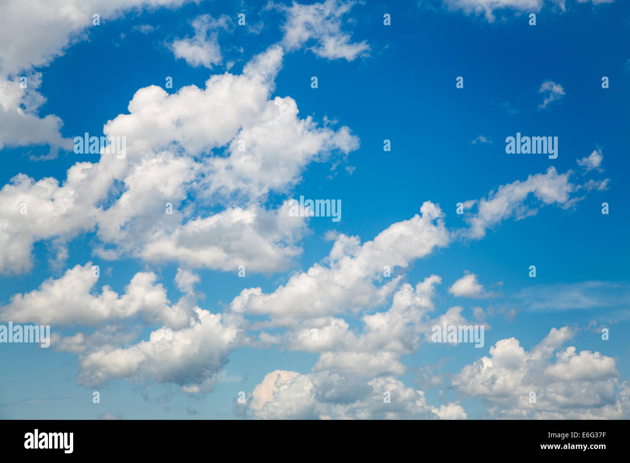Blue sky background with white clouds in summer time Stock Photo - Alamy