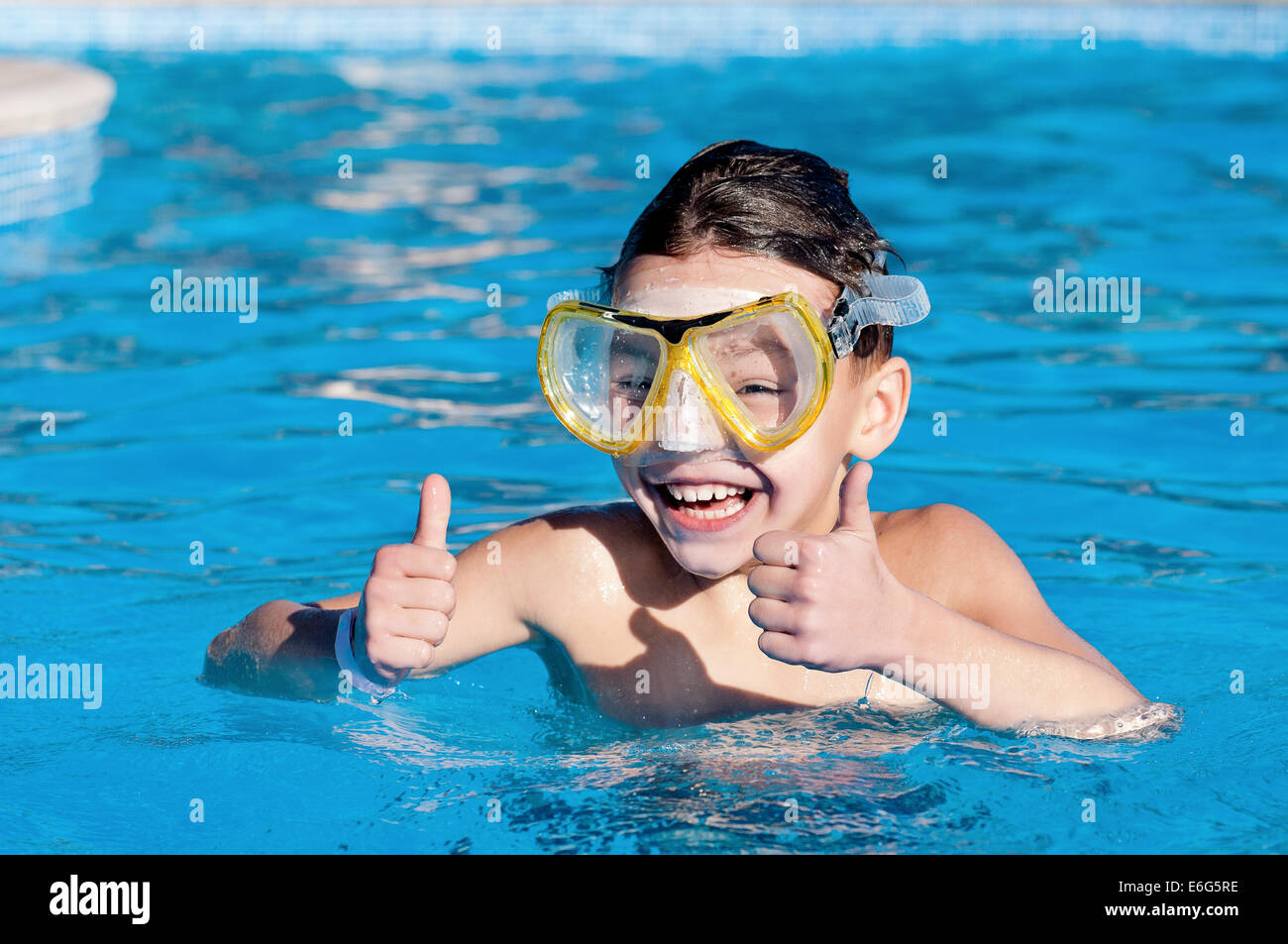 Boy in pool Stock Photo