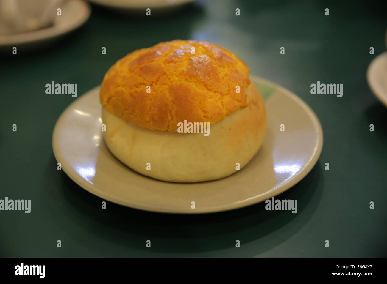 A pineapple bun is a kind of sweet bun predominantly popular in Hong