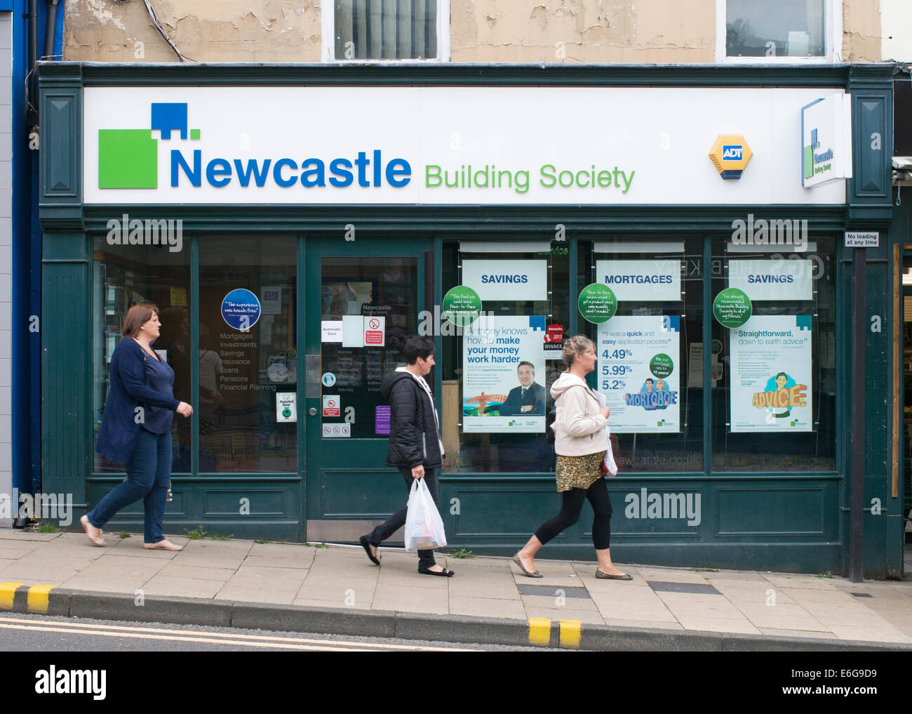 People walking past the Newcastle Building society, Chester-le-Street, north east England, UK Stock Photo